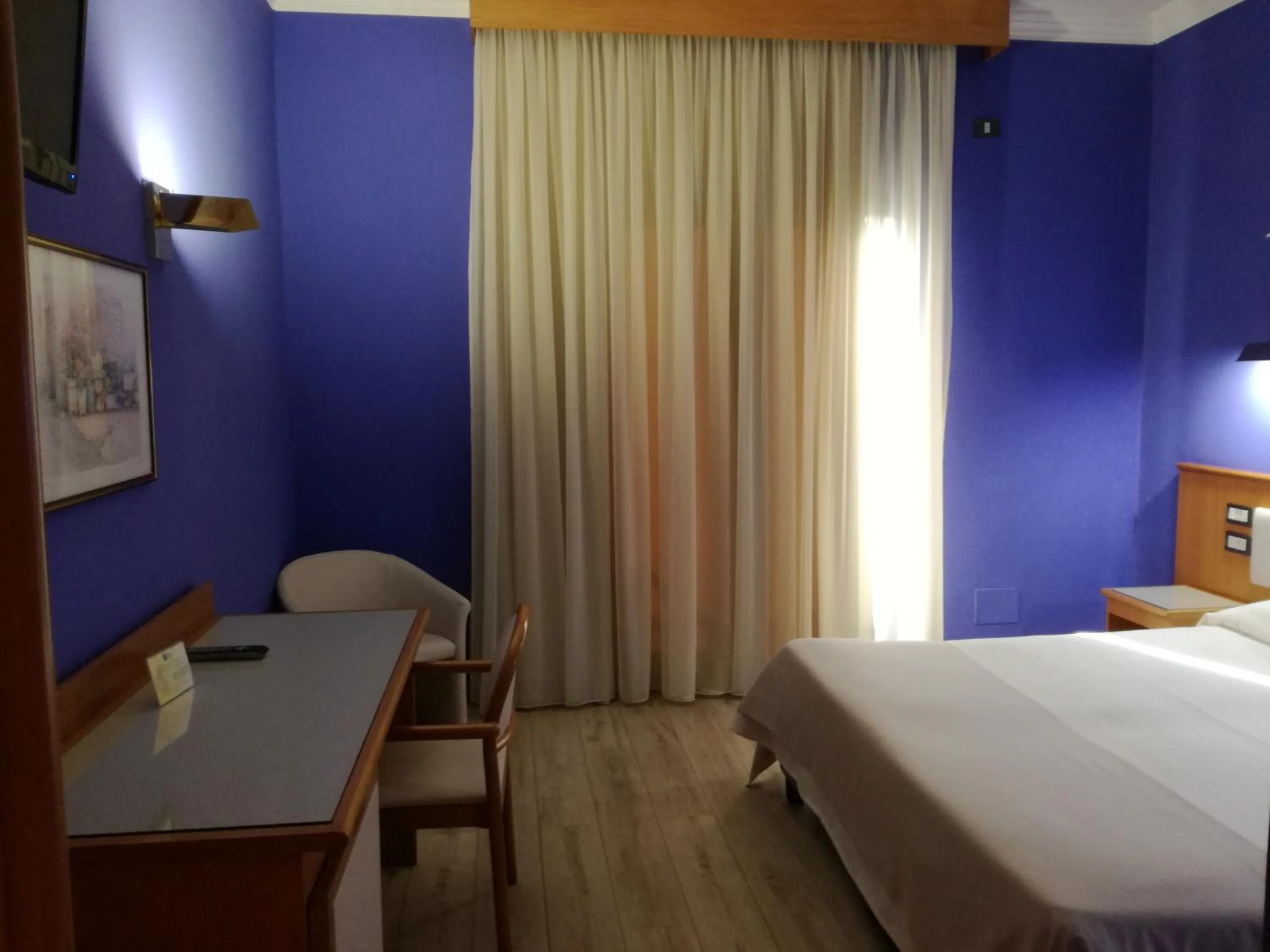 Bed in FILIPPONE HOTEL&RISTORANTE