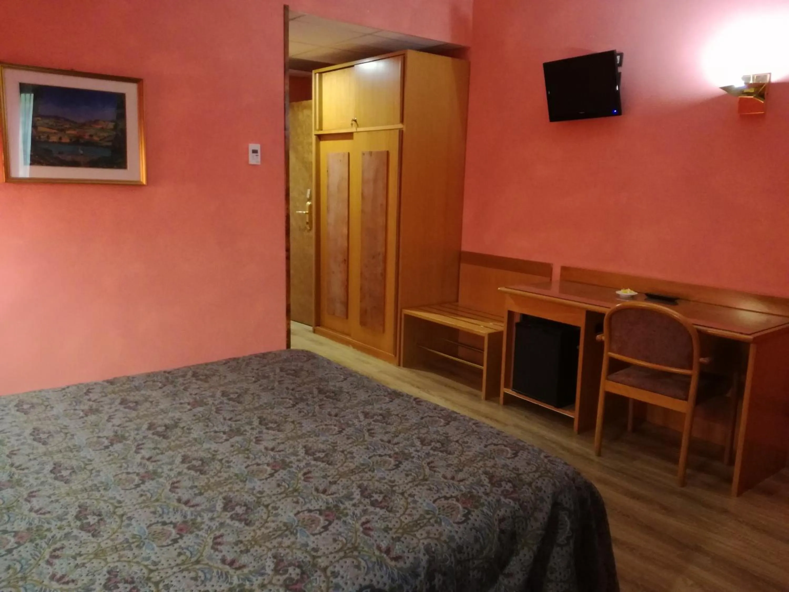 Bed in FILIPPONE HOTEL&RISTORANTE