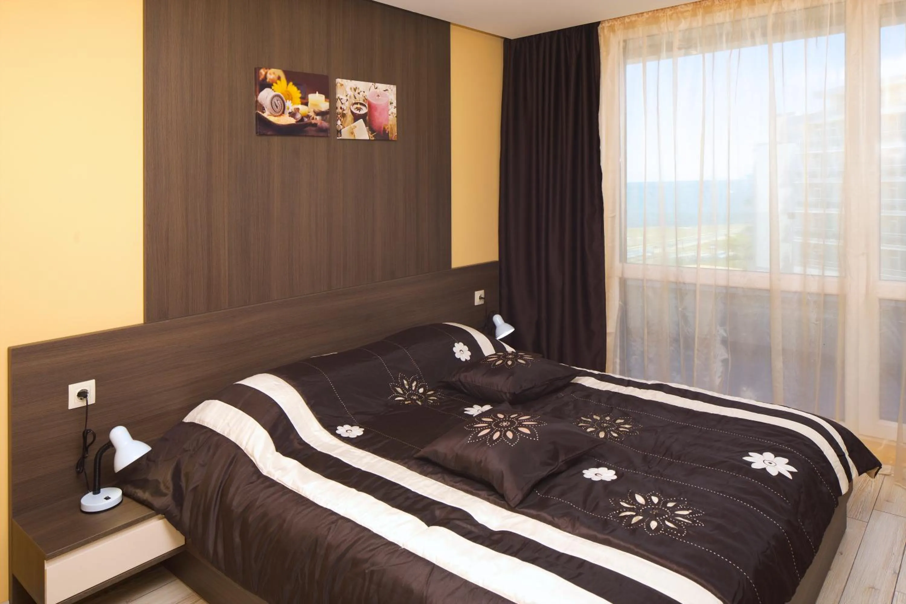 Bed in Aparthotel Paradiso