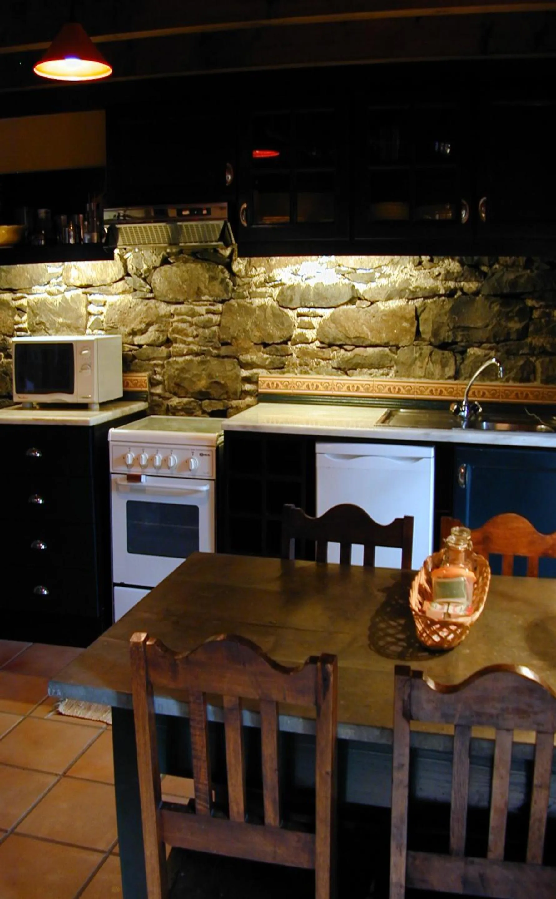 Kitchen or kitchenette in Pestana Quinta do Arco Nature & Rose Garden Hotel