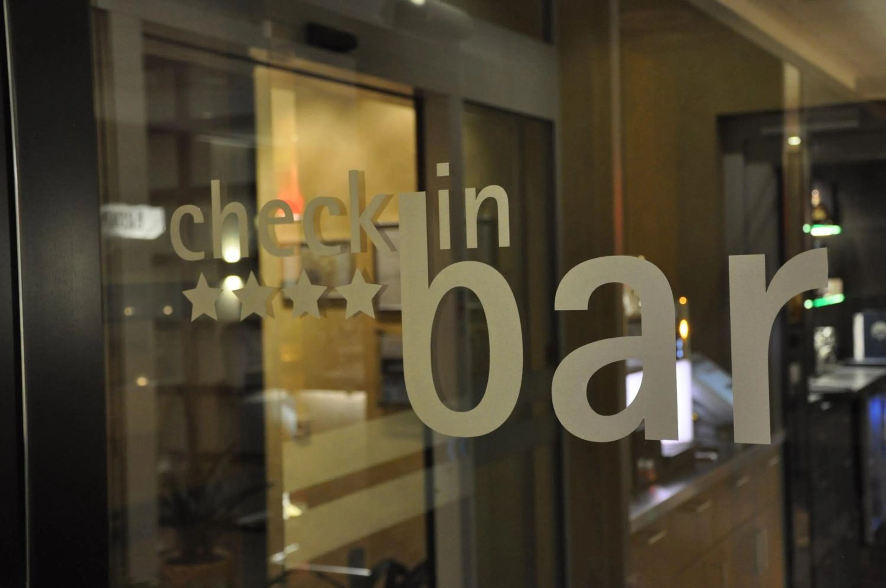 Property logo or sign in Hotel Merkur