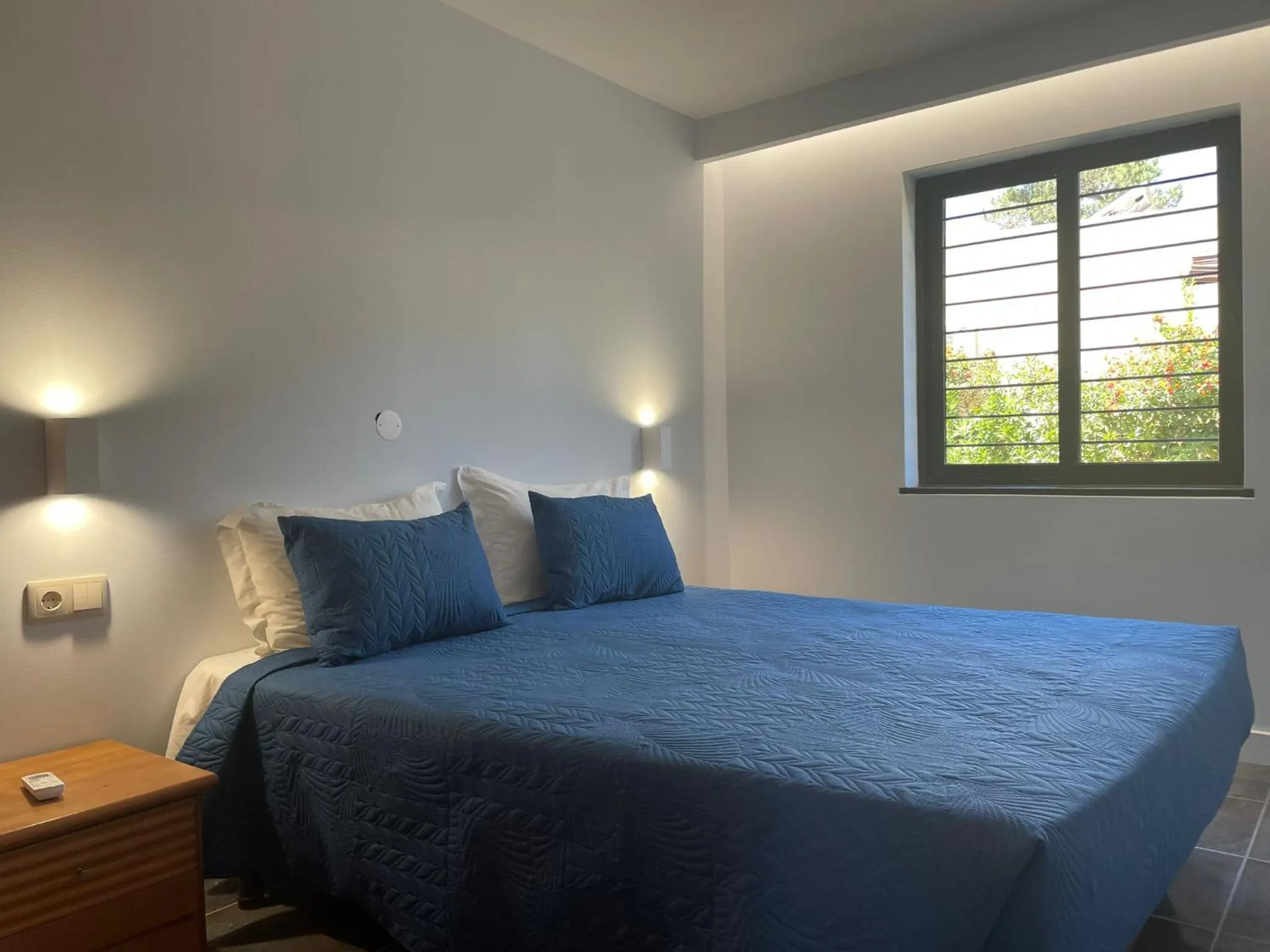 Bed in Apartamentos Honorio - Pool and Garden