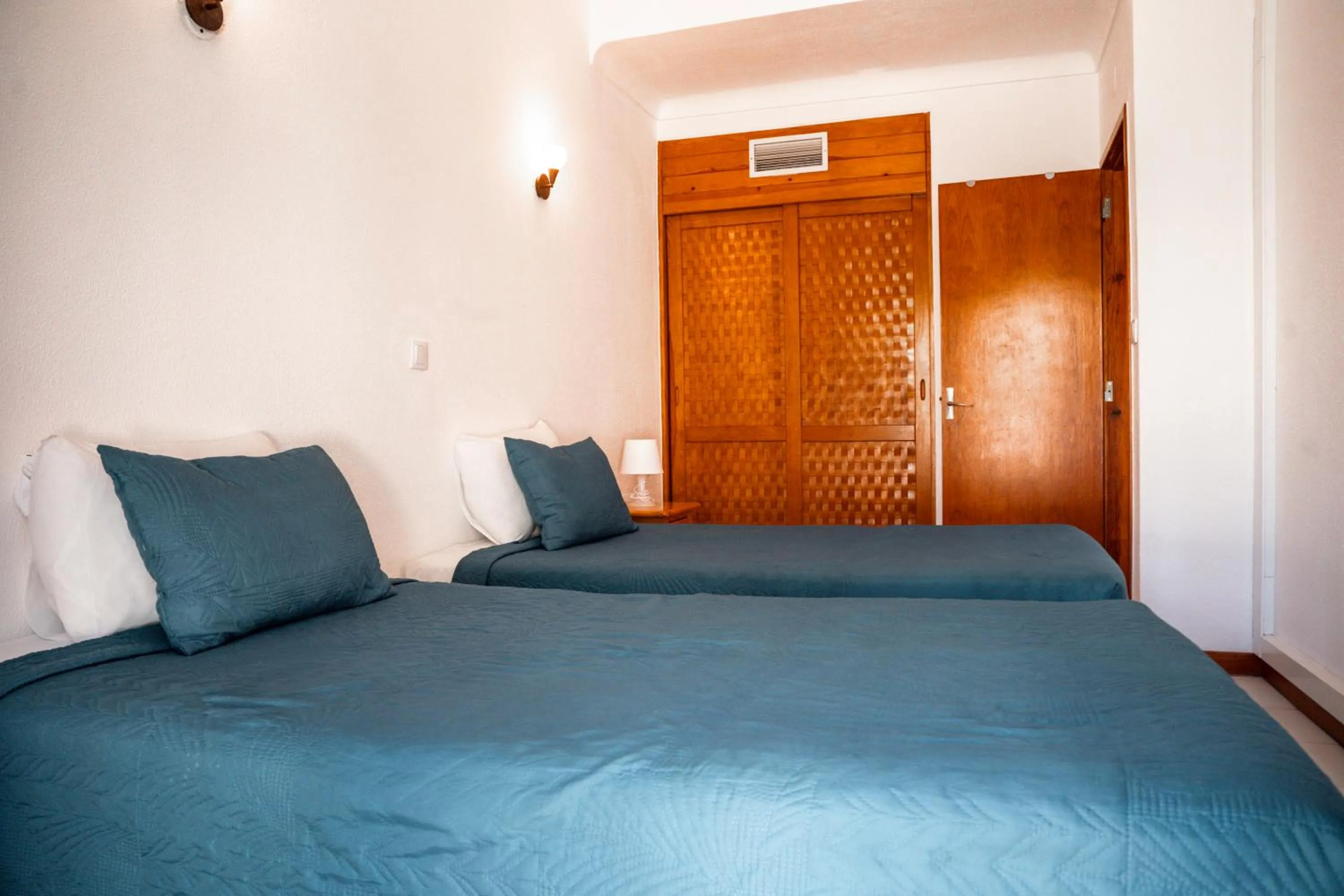 Bed in Apartamentos Honorio - Pool and Garden