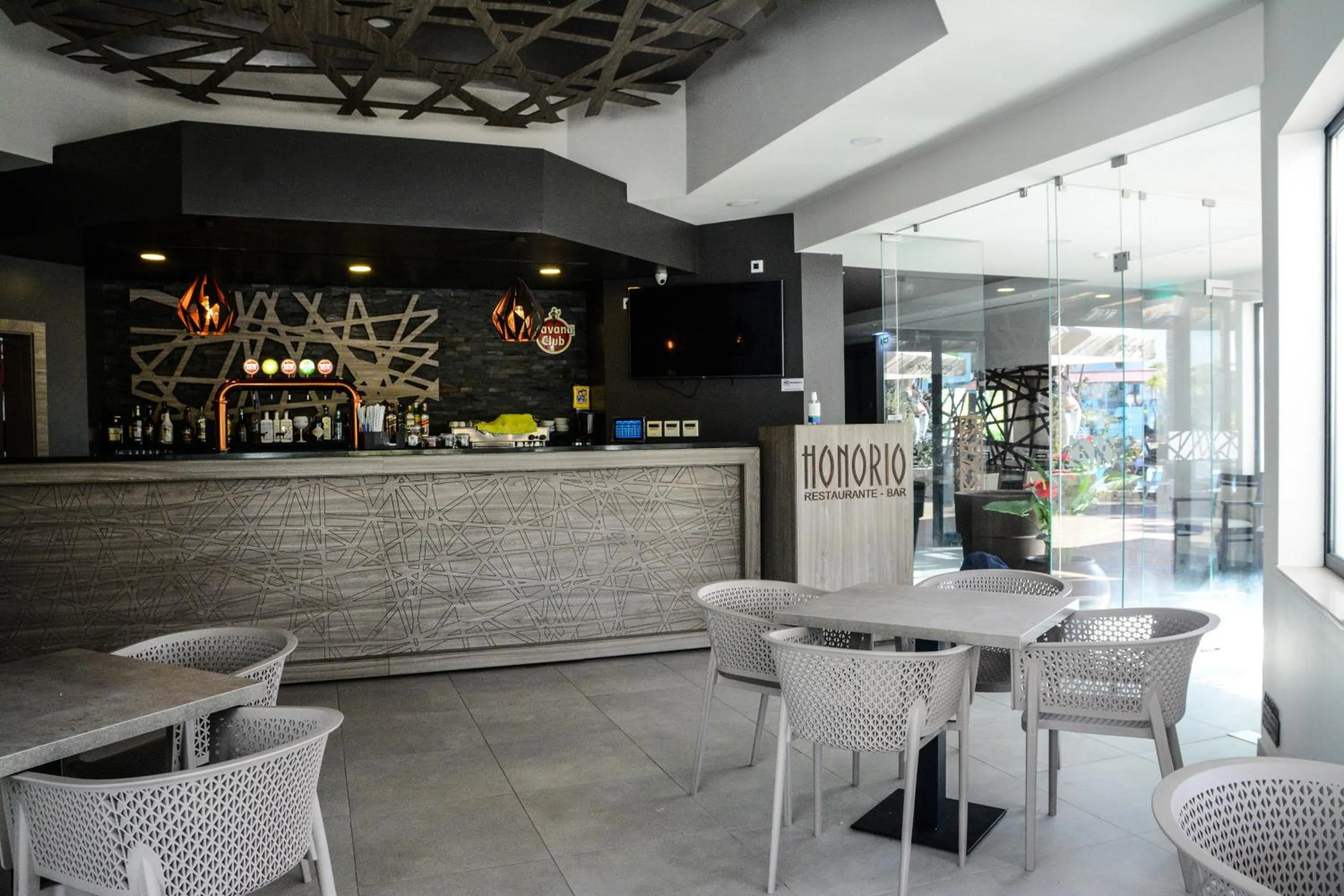 Lounge or bar in Apartamentos Honorio - Pool and Garden