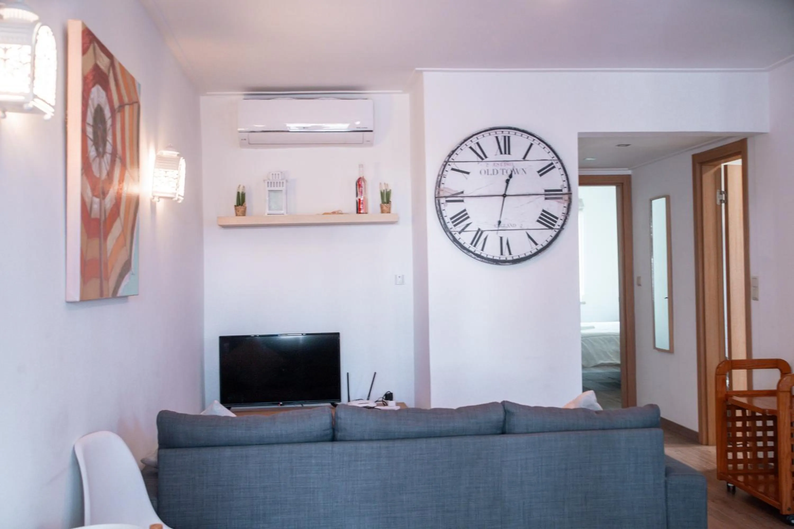 TV and multimedia in Apartamentos Honorio - Pool and Garden