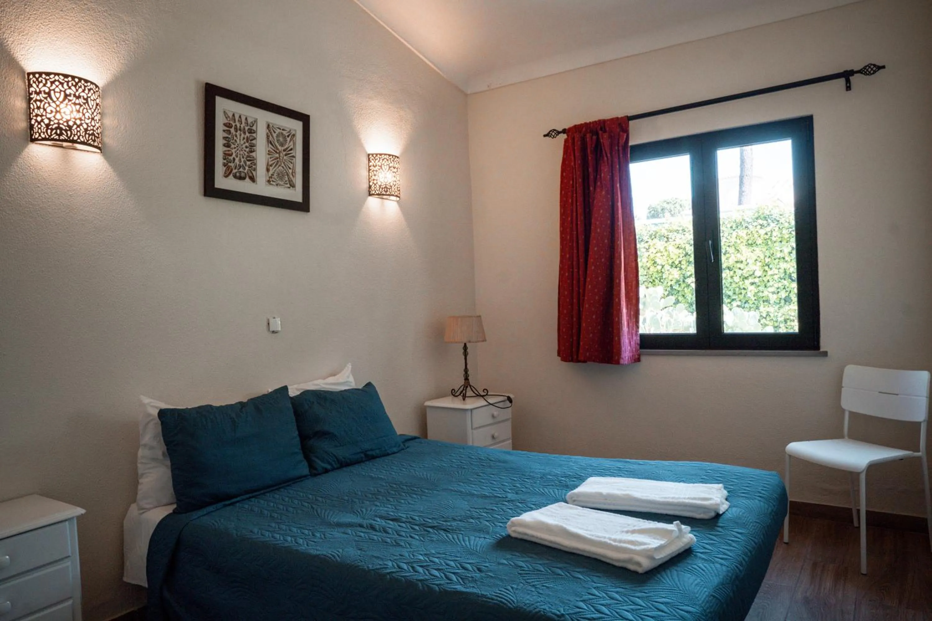 Bed in Apartamentos Honorio - Pool and Garden