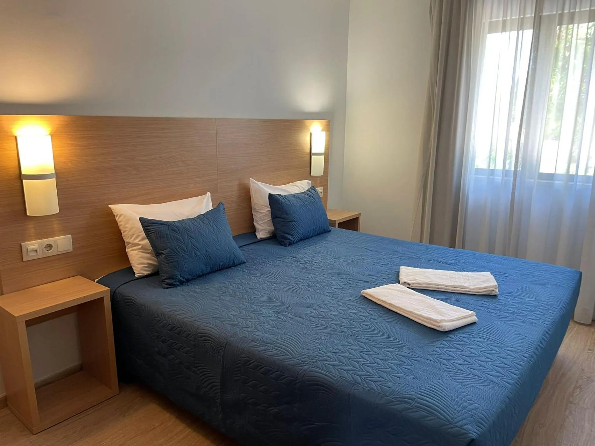 Bedroom in Apartamentos Honorio - Pool and Garden