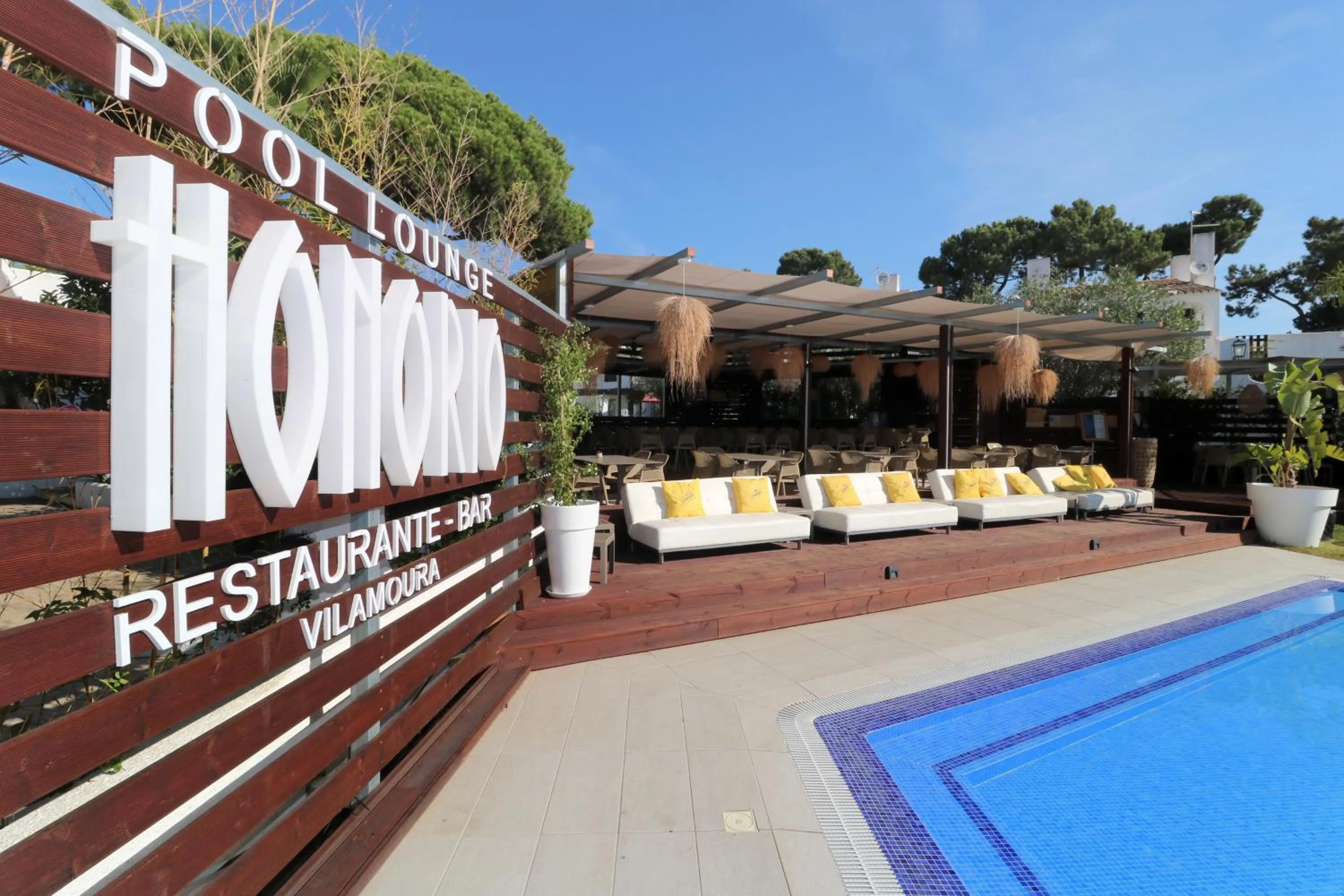 Property logo or sign in Apartamentos Honorio - Pool and Garden