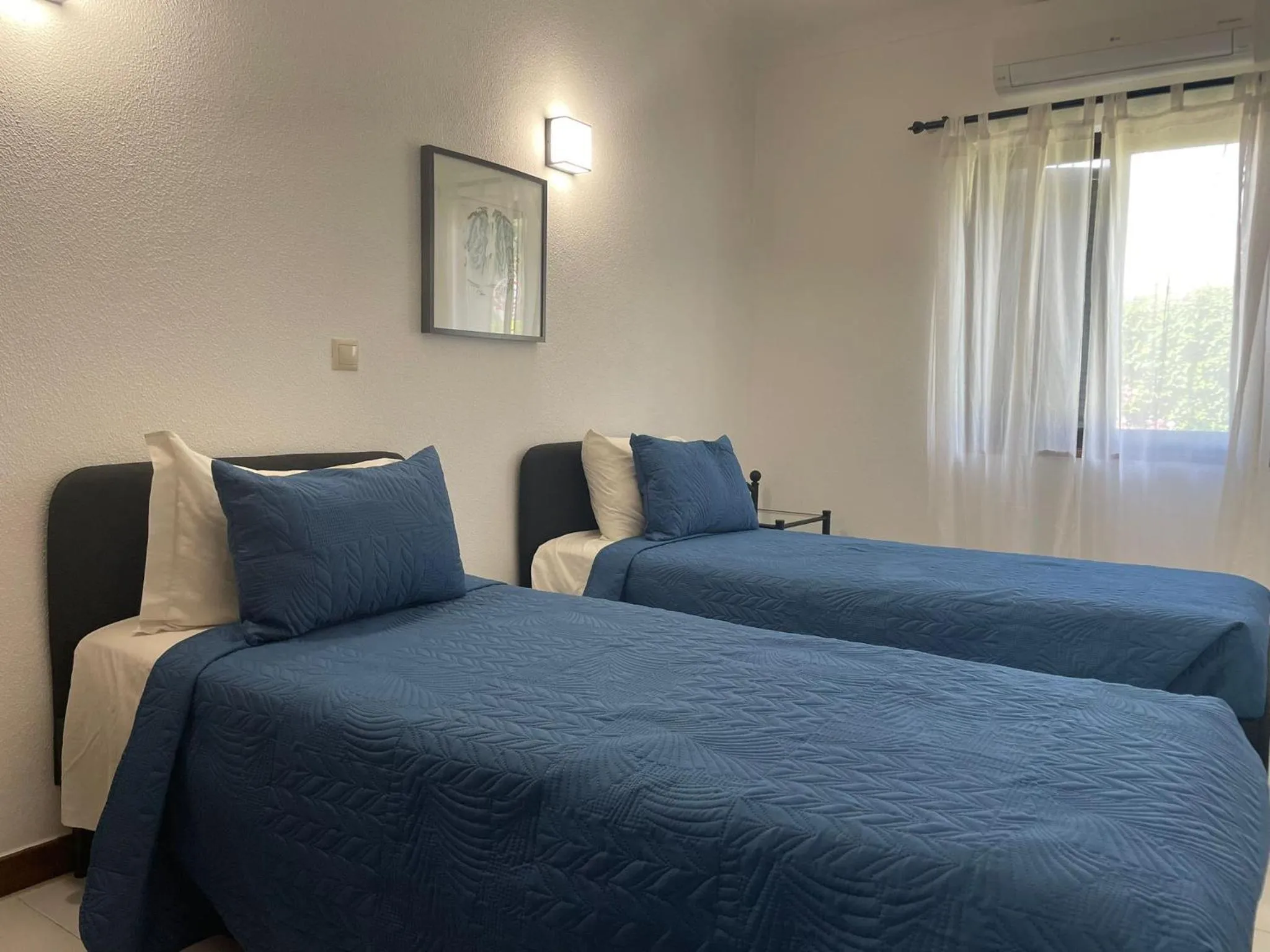 Bed in Apartamentos Honorio - Pool and Garden