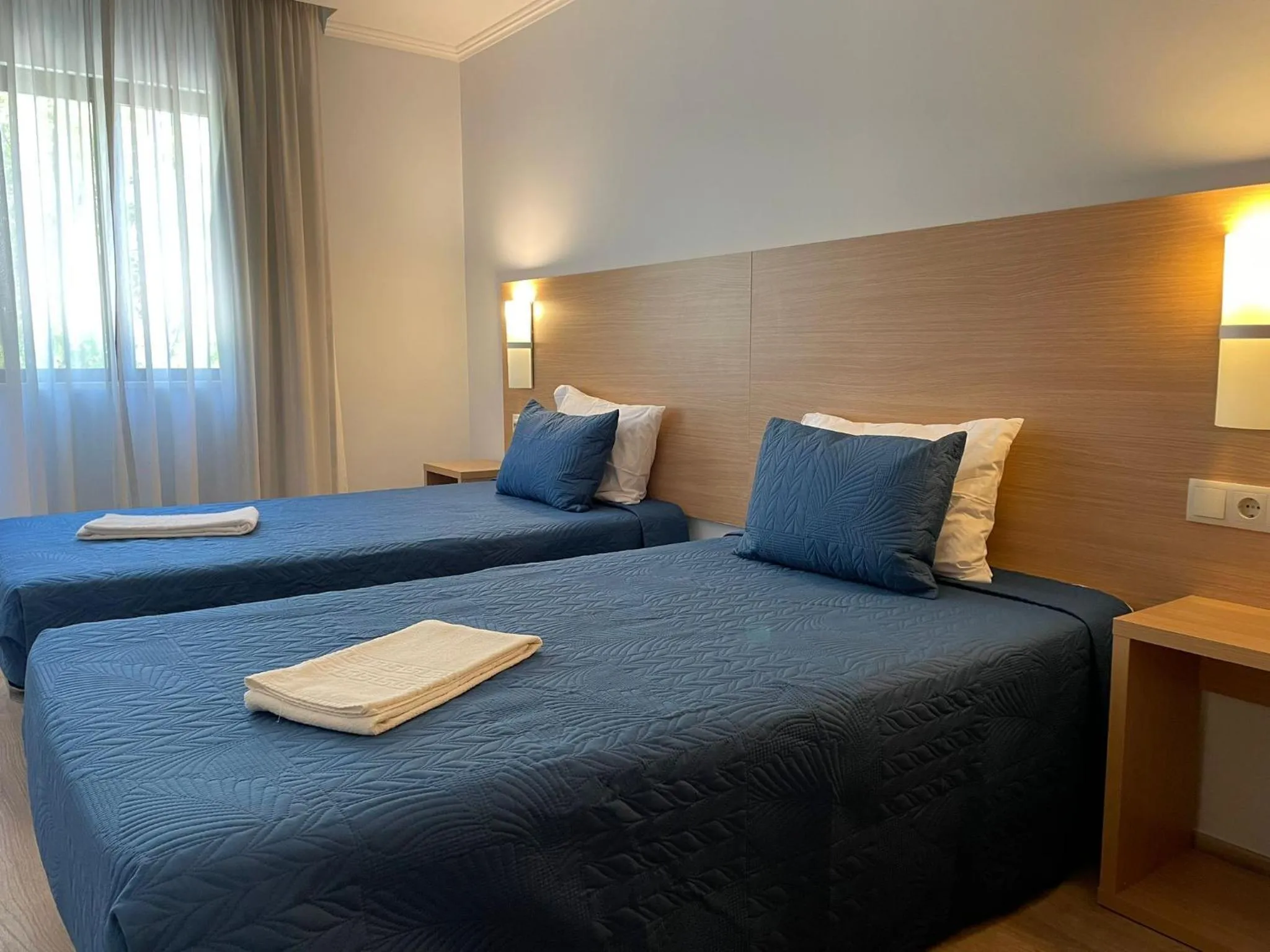 Bedroom in Apartamentos Honorio - Pool and Garden