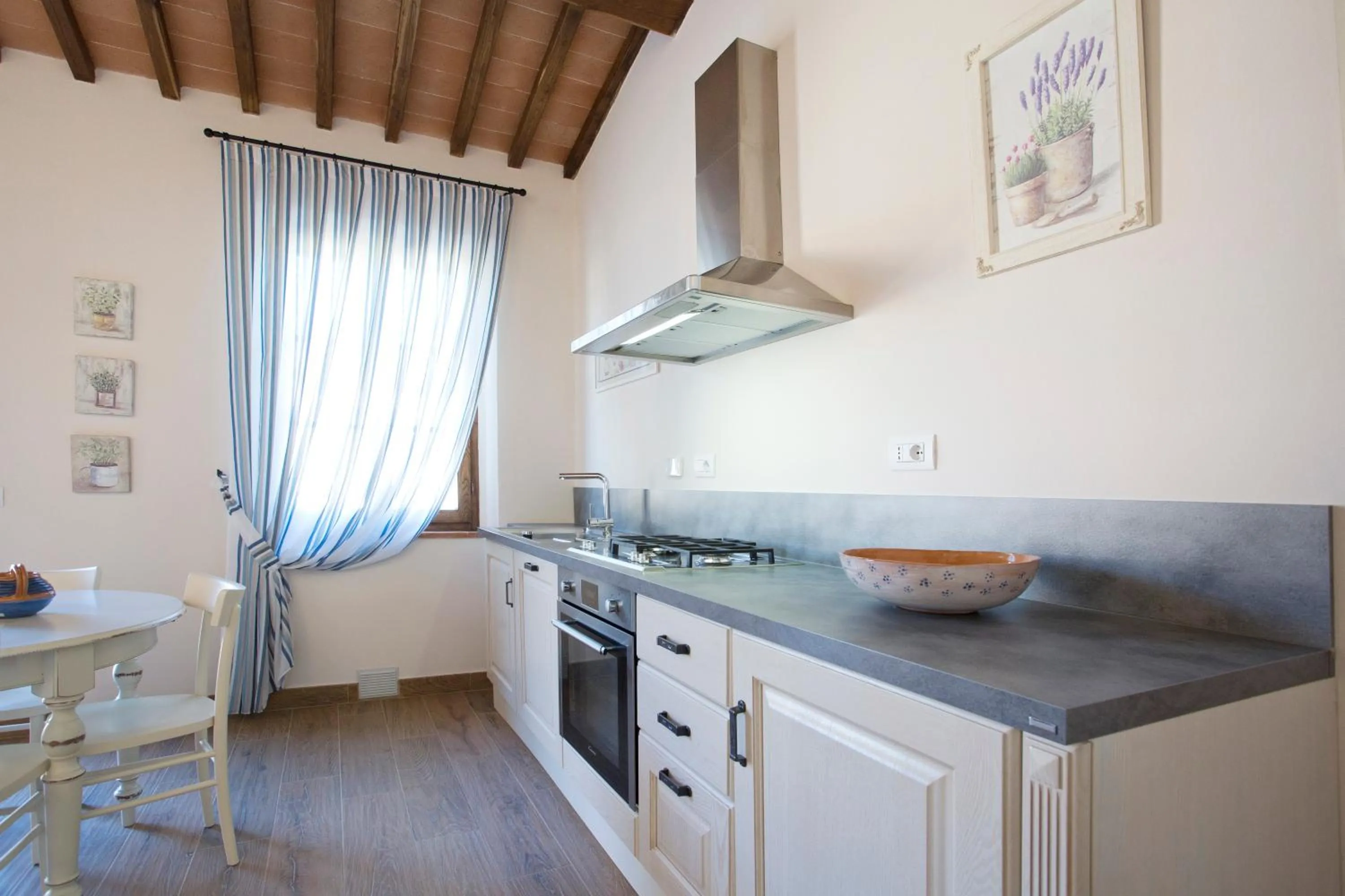 Kitchen or kitchenette in Casale San Galgano
