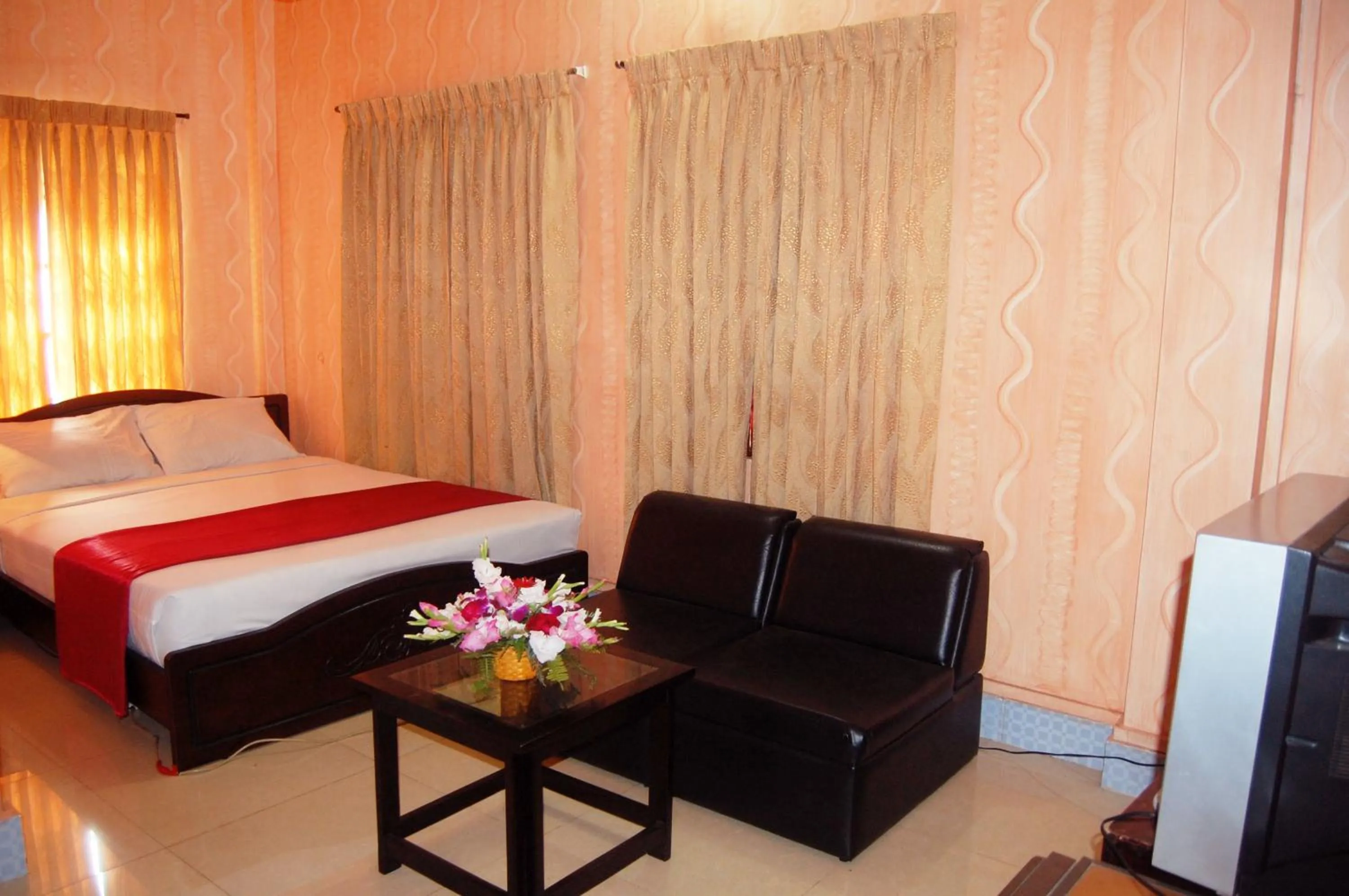 Bed in Hotel Swiss Garden International
