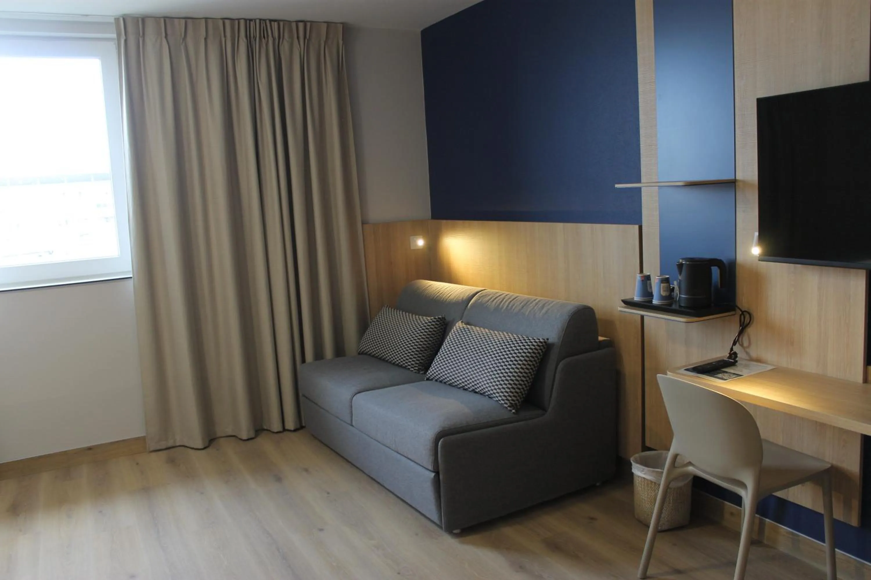 Seating area in Kyriad Anglet - Biarritz