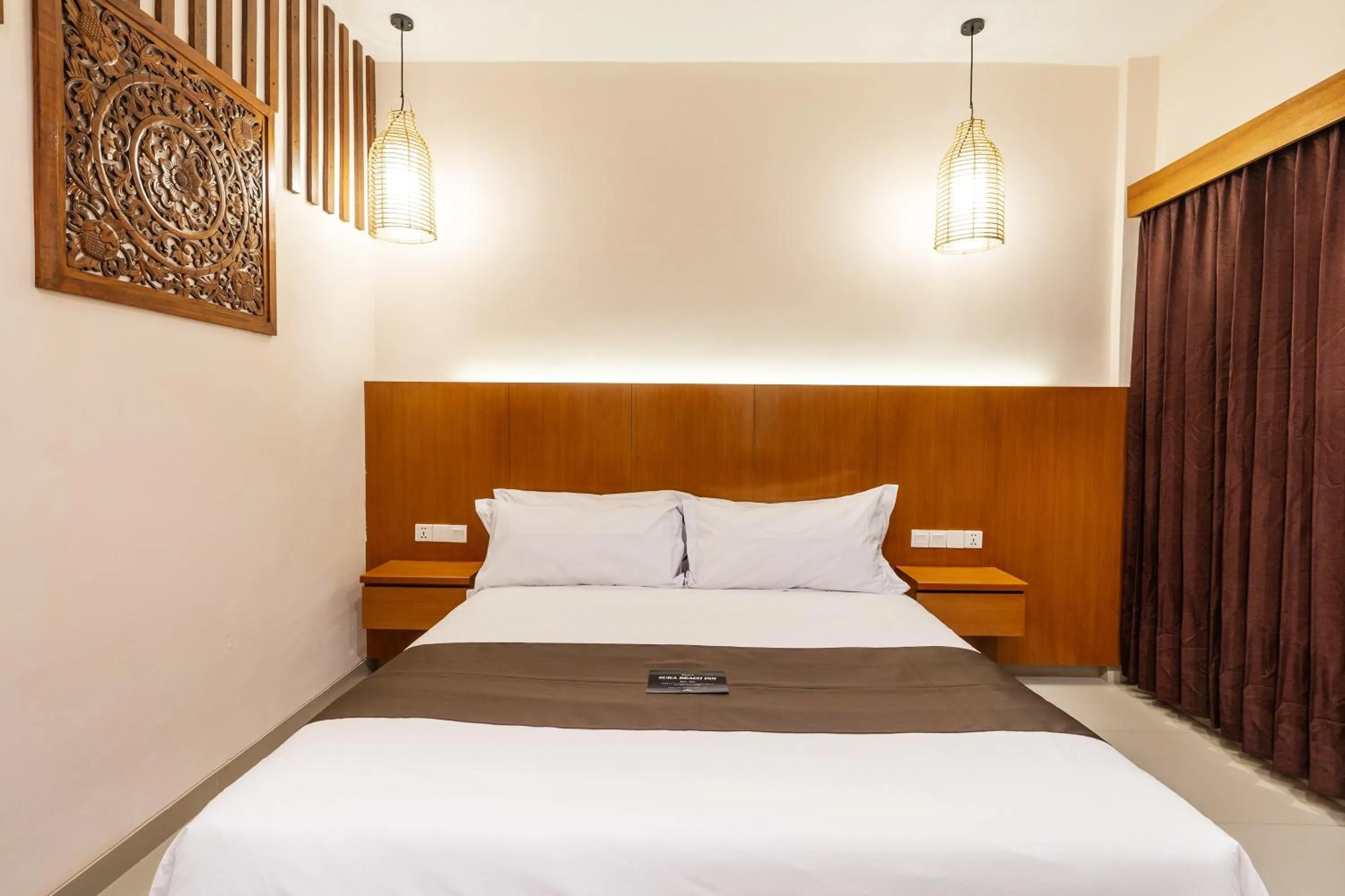 Bed in Suka Beach Inn