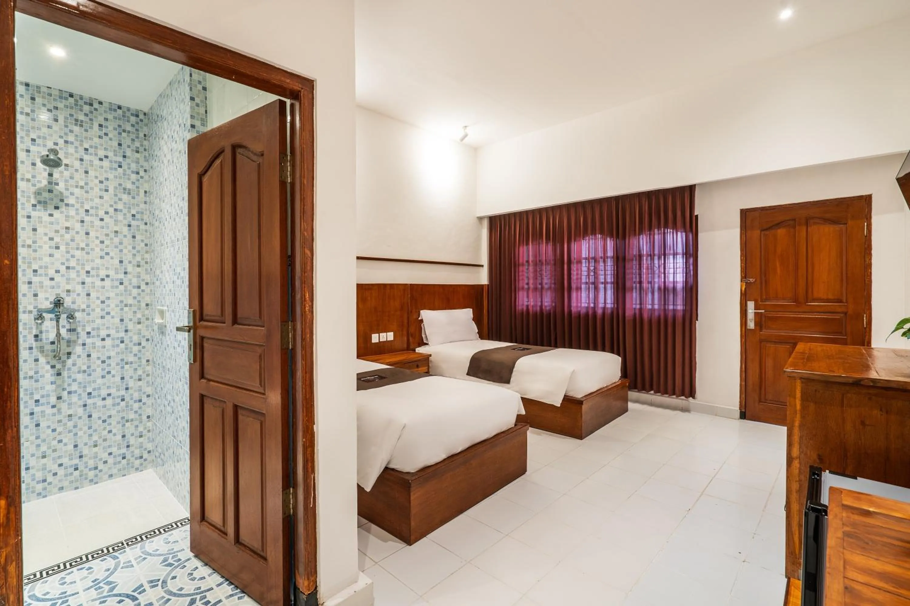 Bedroom, Bed in Suka Beach Inn