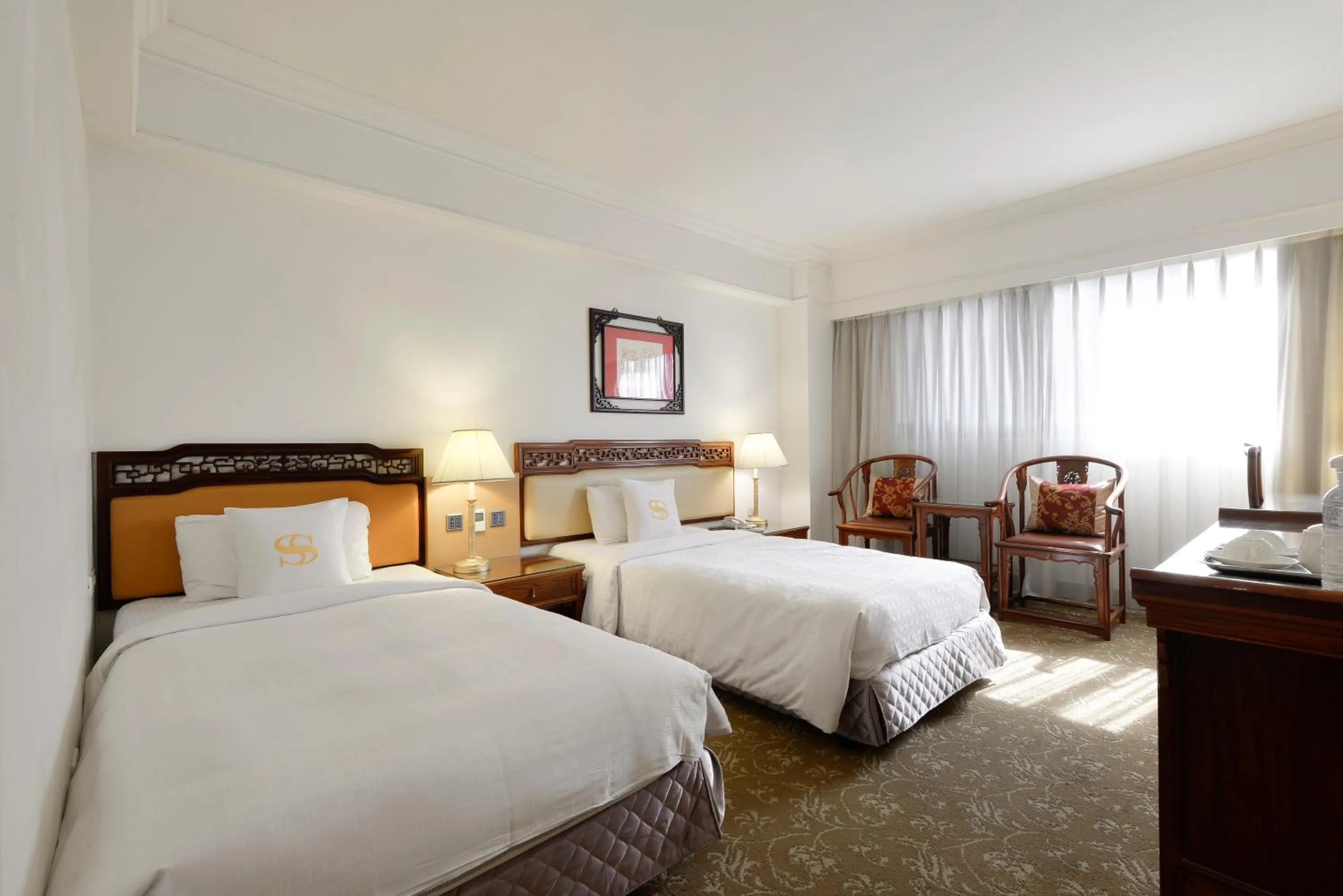 Bed in Hotel Sunshine