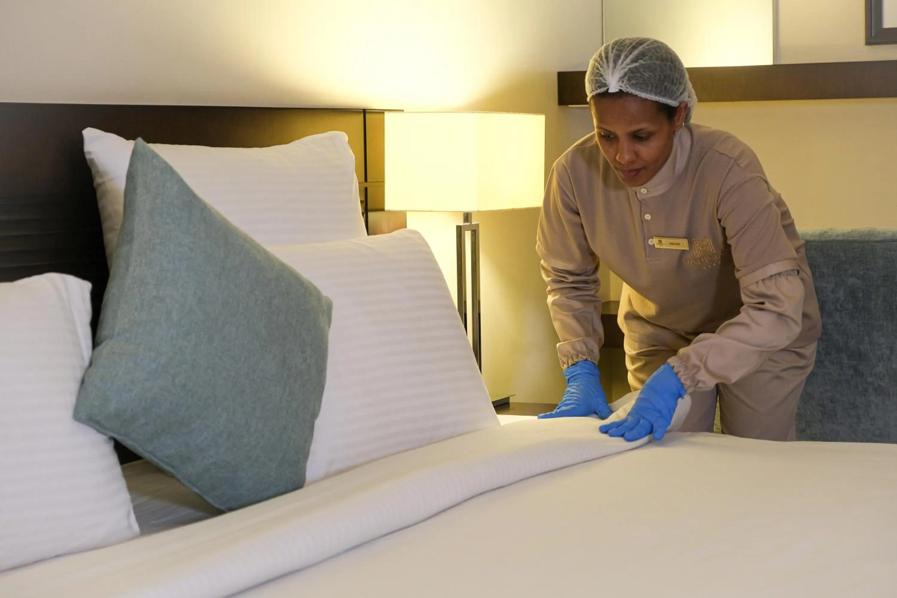 Staff, Bed in The Parisian Hotel