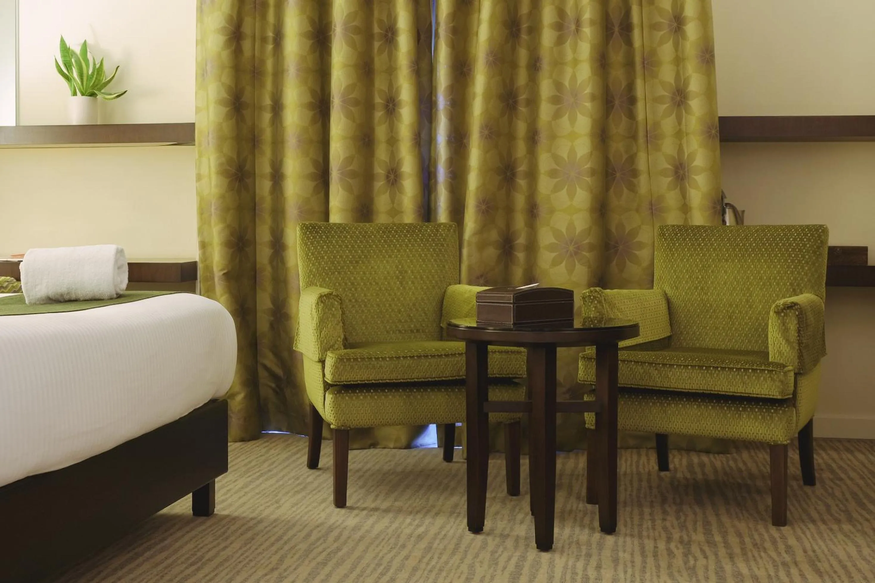 Seating area, Bed in The Parisian Hotel