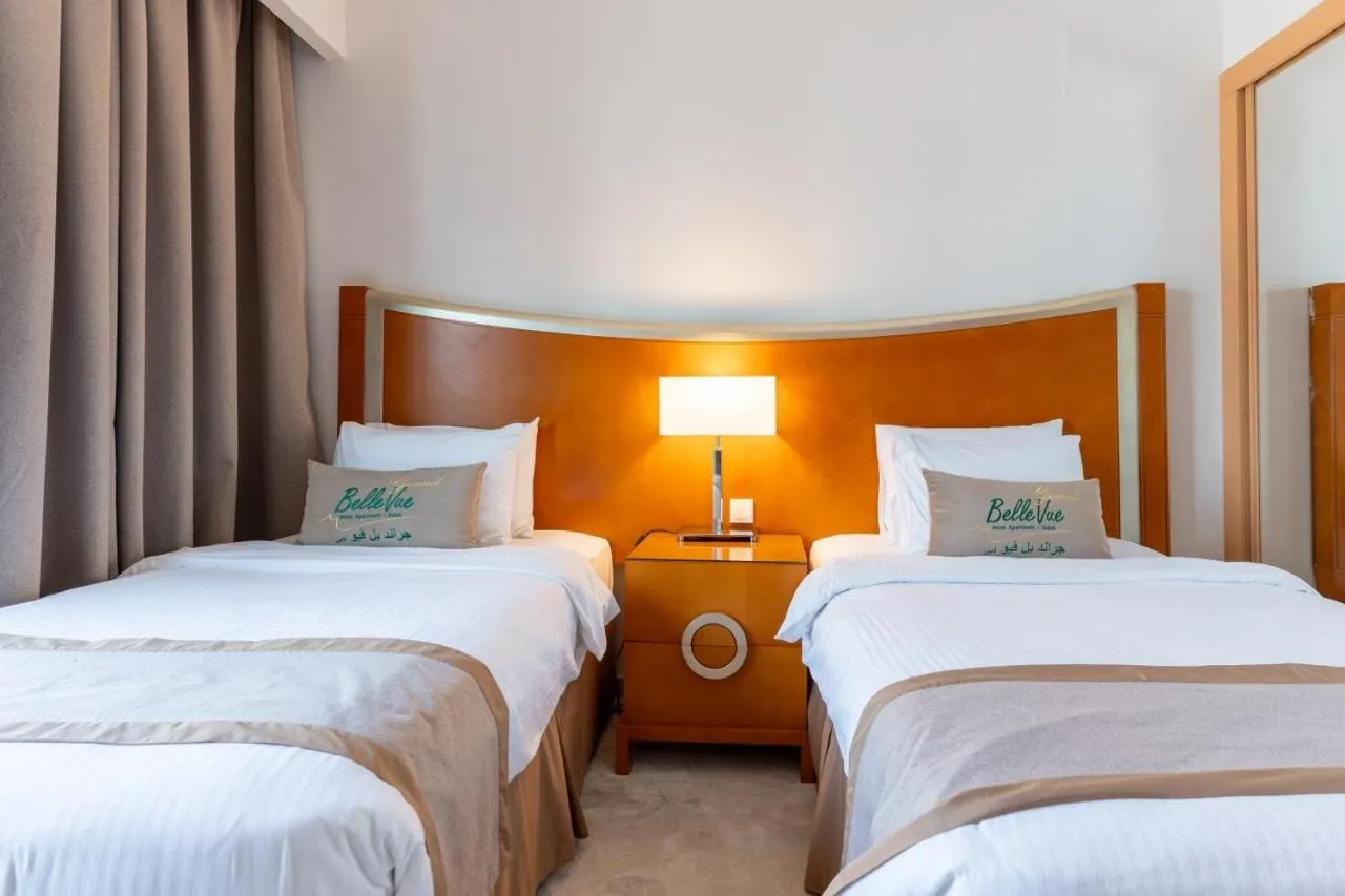Bed in Grand Bellevue Hotel Apartment Dubai