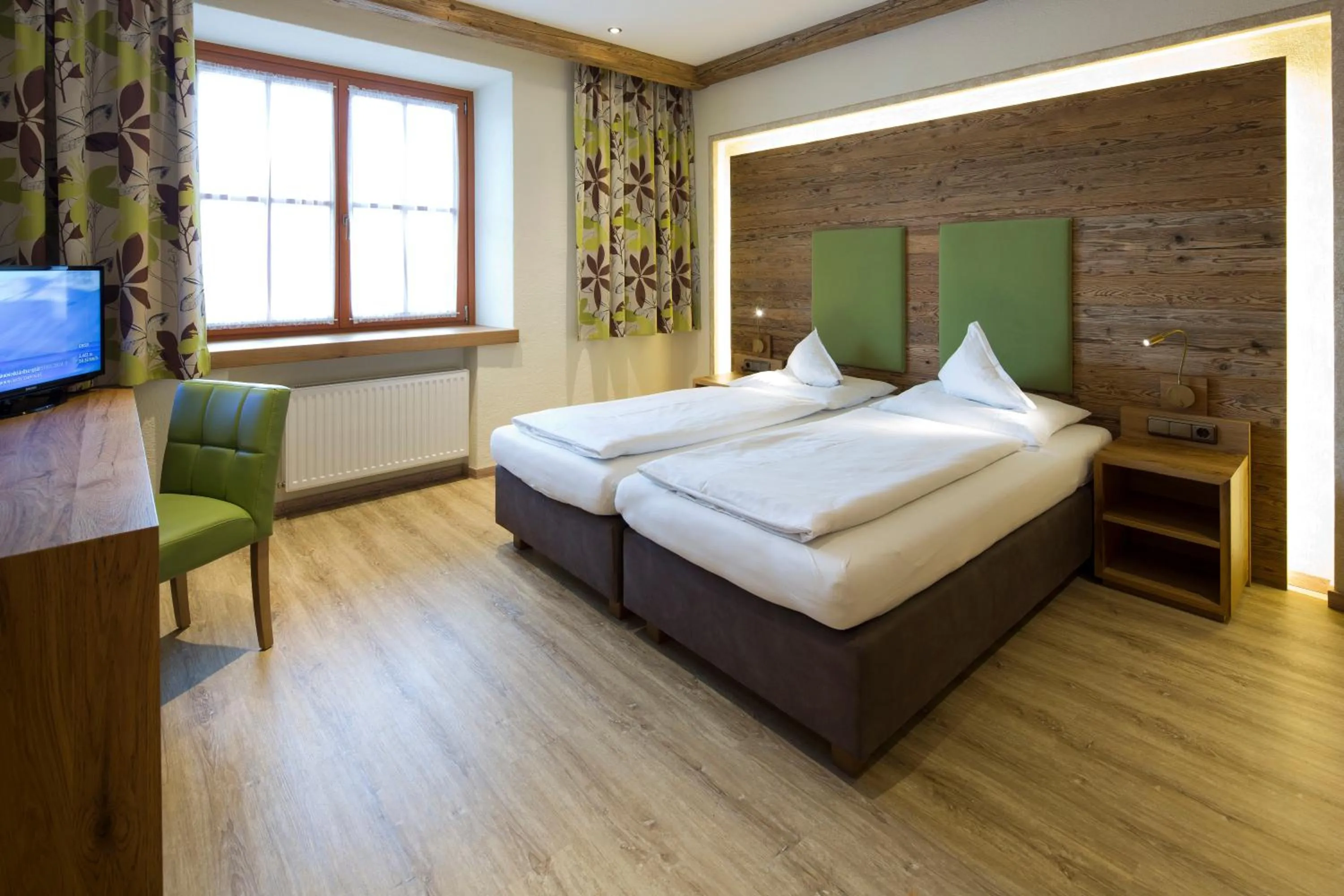 Photo of the whole room, Bed in Hotel Gasthof Obermair