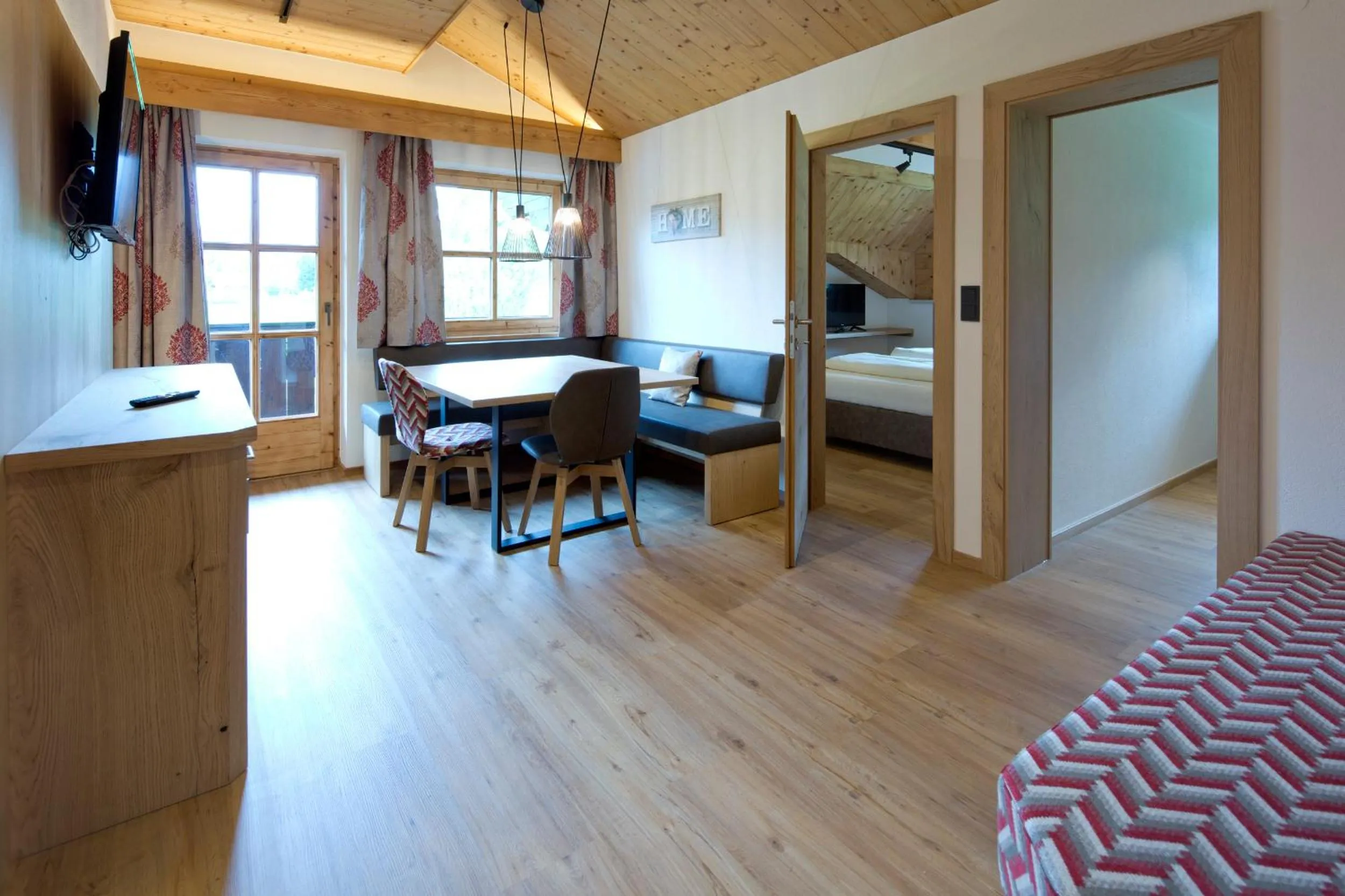 Living room, Bed in Hotel Gasthof Obermair