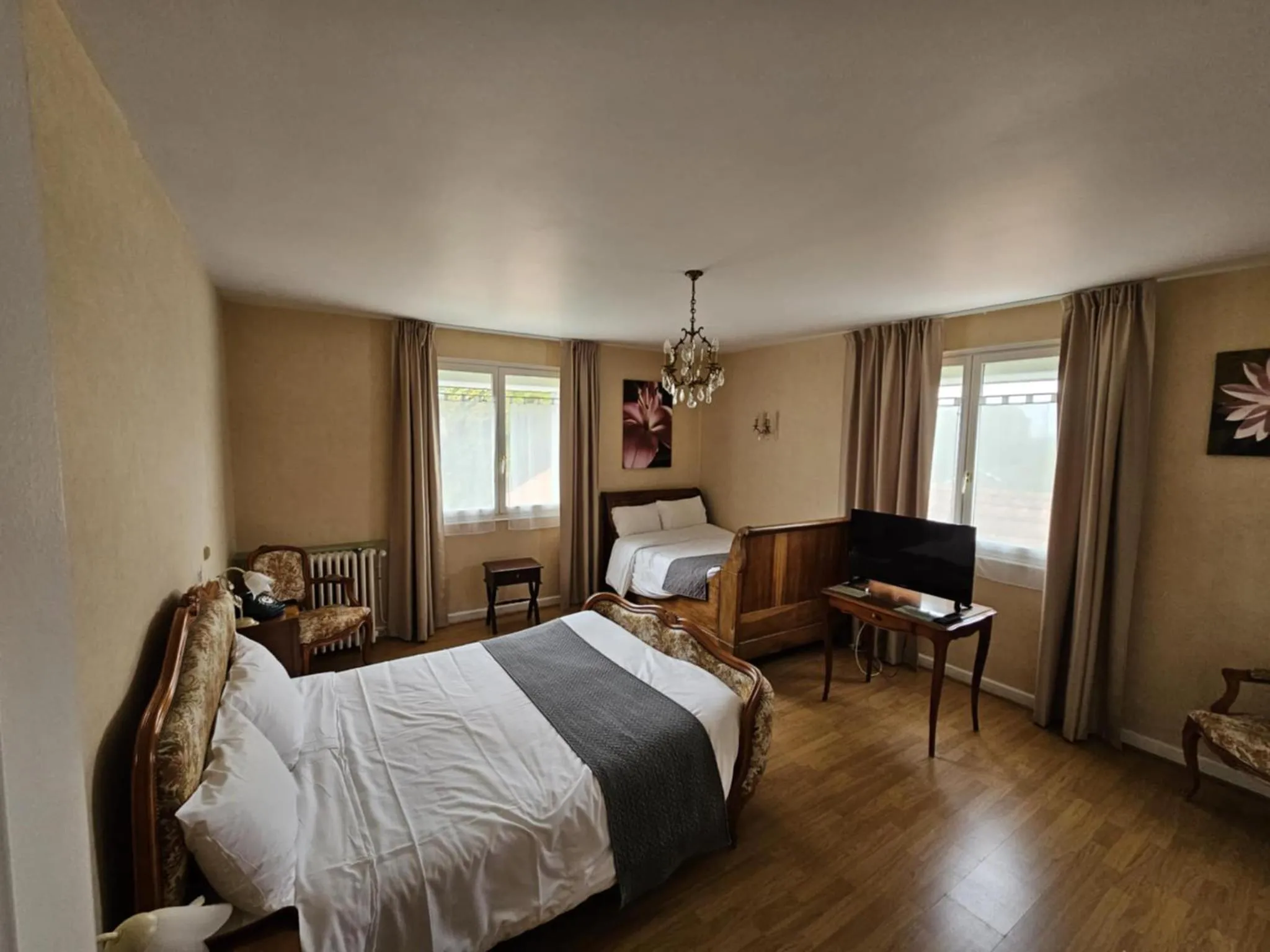 Bed in Hotel du Commerce Chez Stéphane