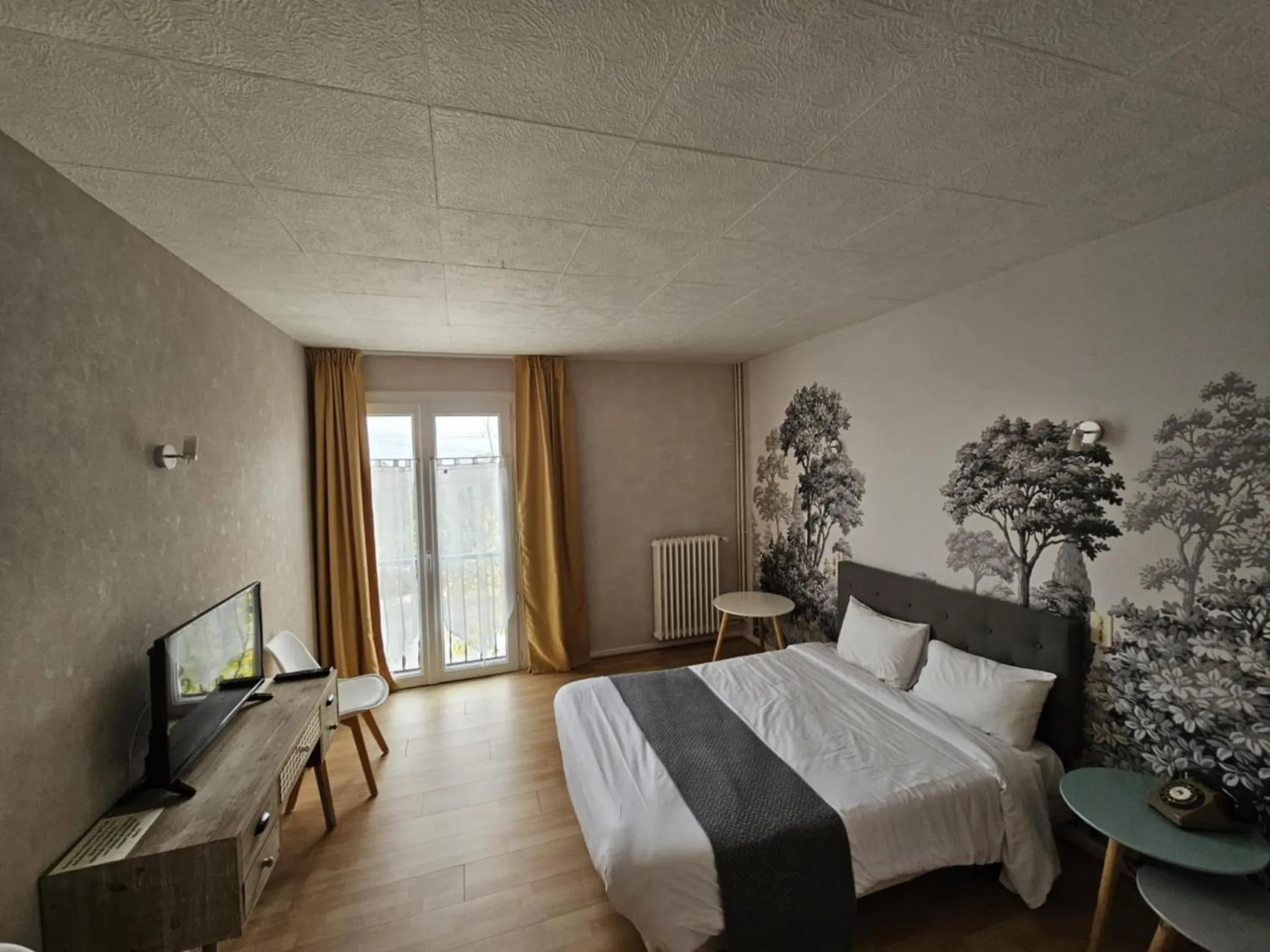 Bed in Hotel du Commerce Chez Stéphane