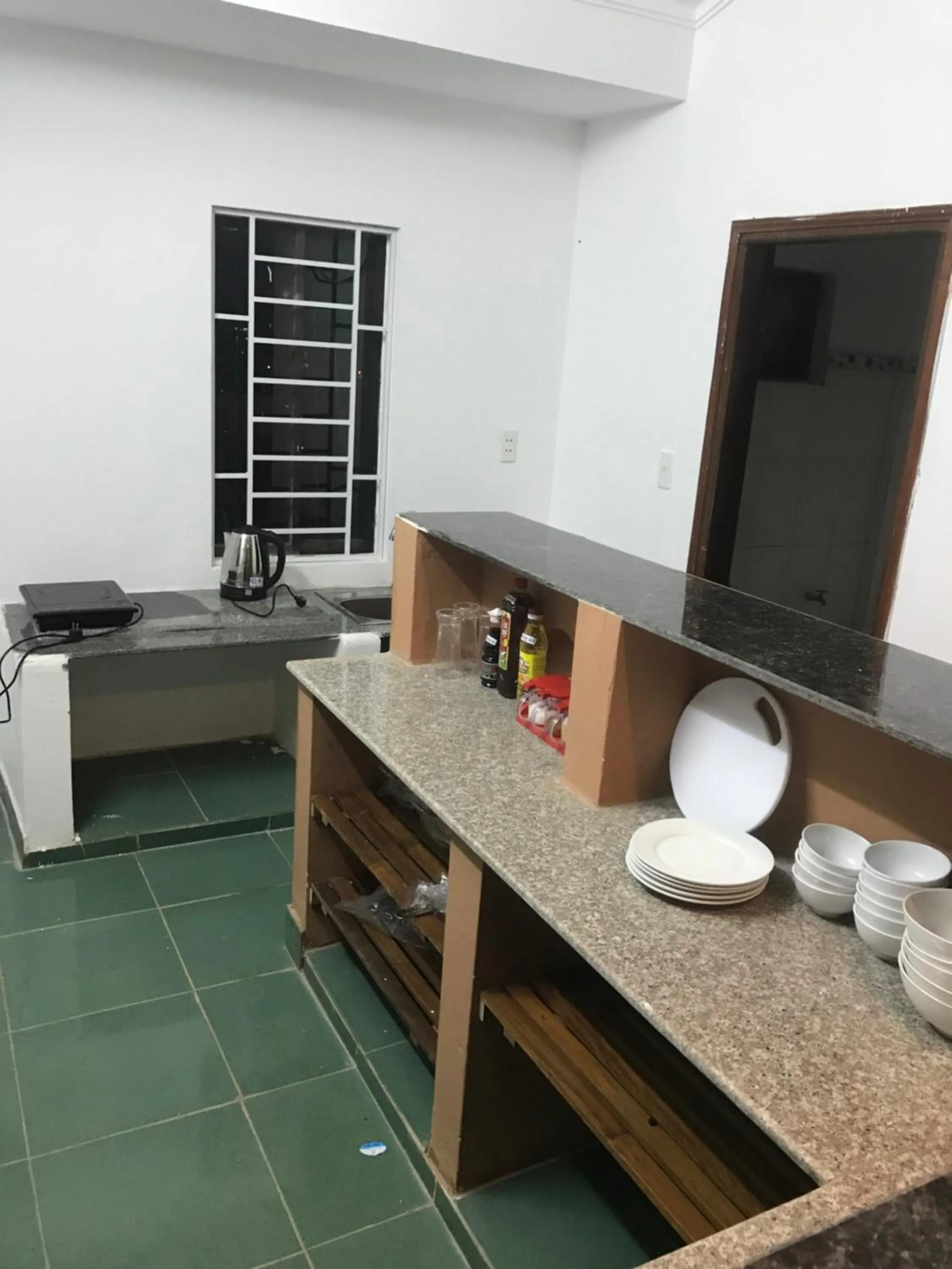 Communal kitchen in Thao Trang Hotel