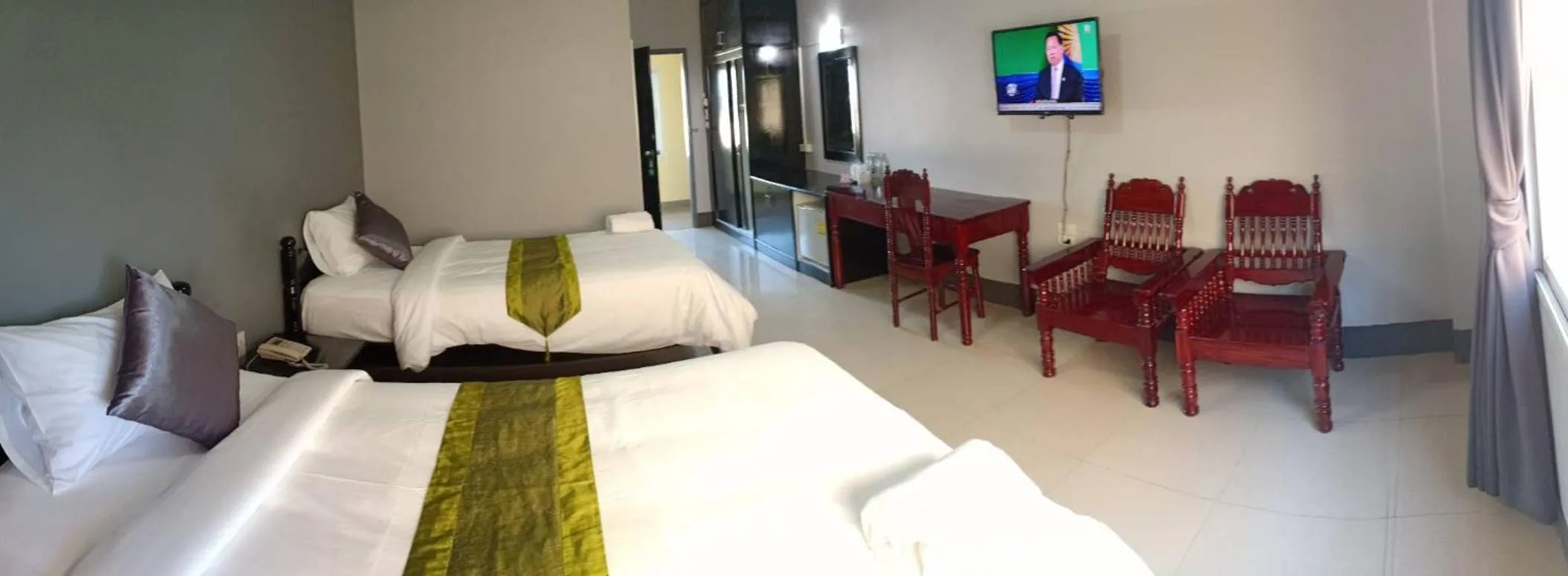 Bed in Submukda Phoomplace Hotel