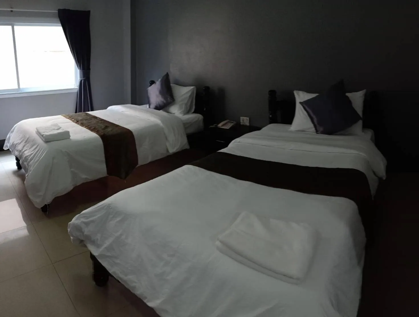 Bed in Submukda Phoomplace Hotel