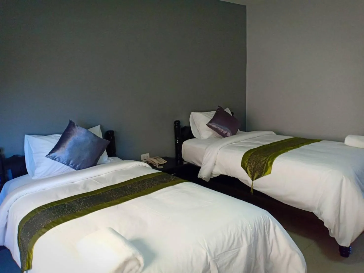 Bed in Submukda Phoomplace Hotel