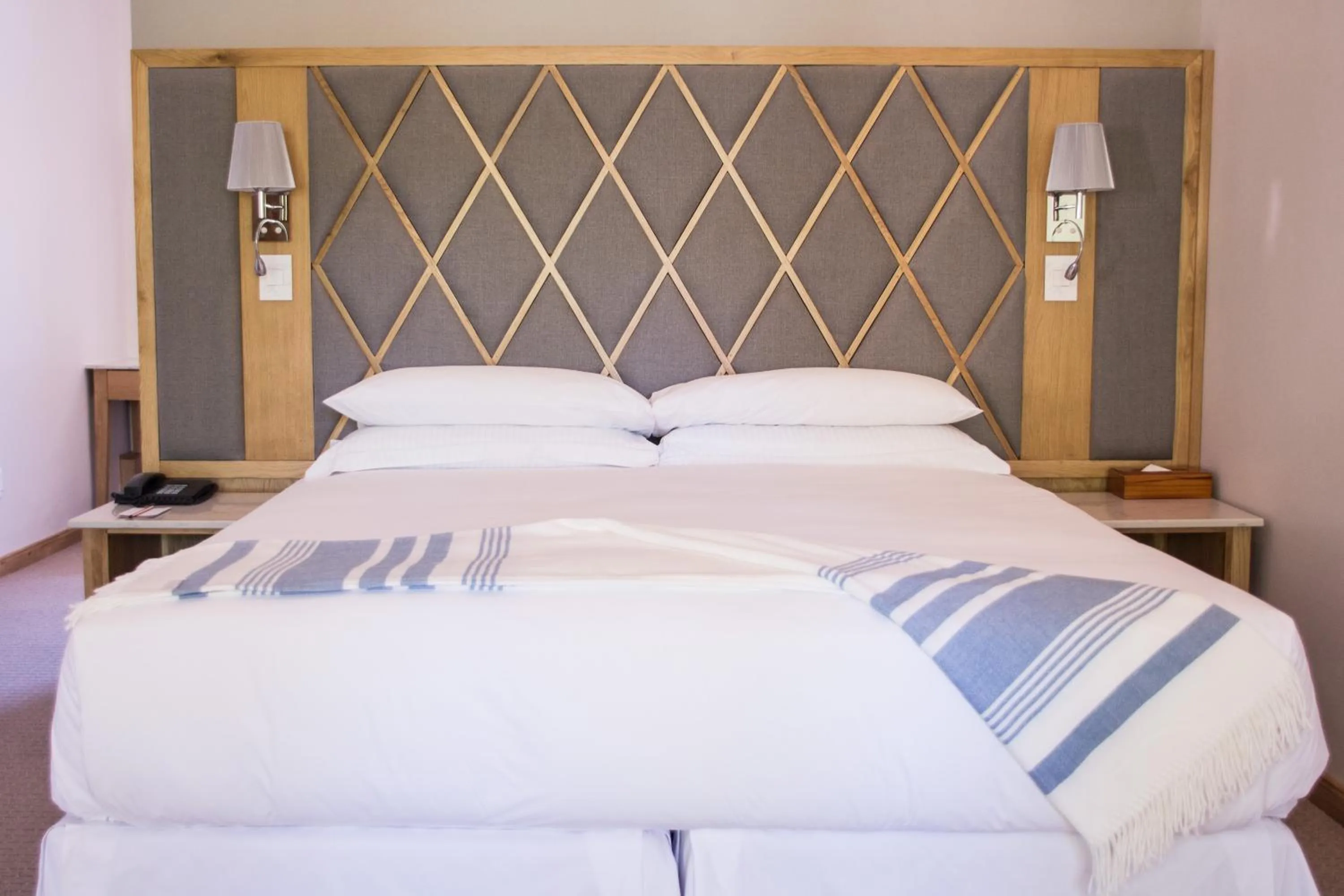 Bed in ASARA Wine Estate & Hotel