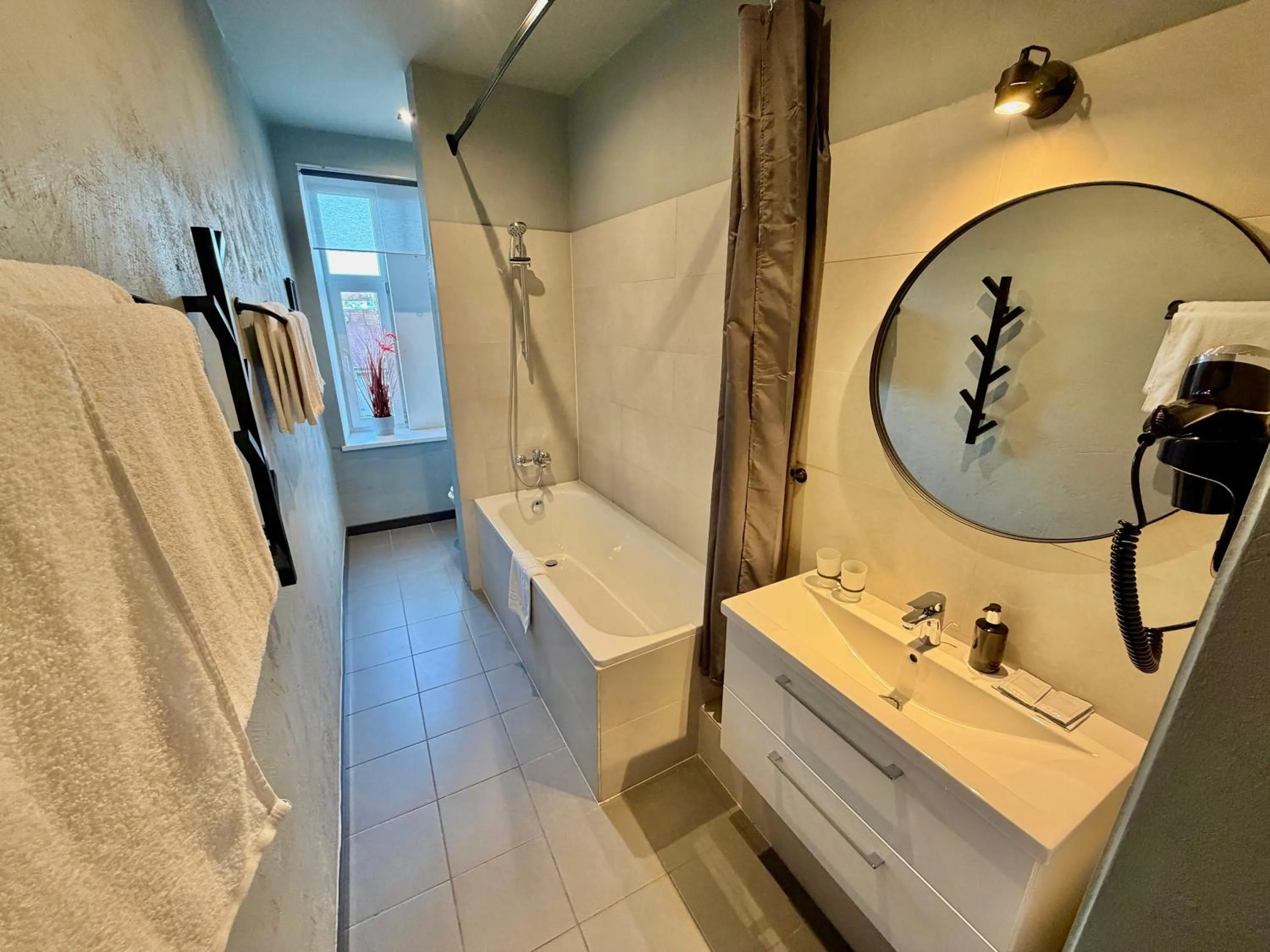 Bathroom in PRIMO Hotel Riga