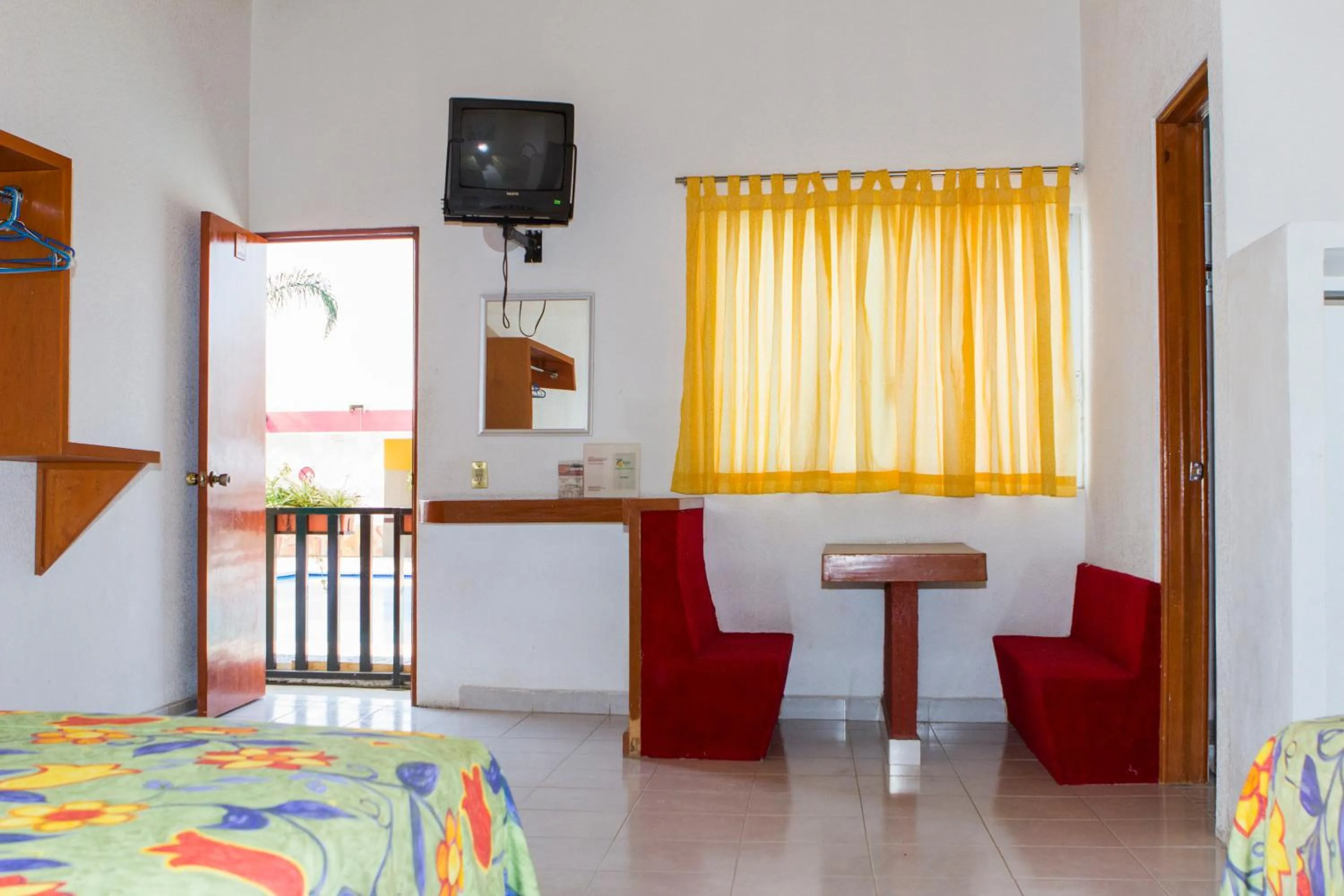 Seating area, Bed in Hotel Kazmay