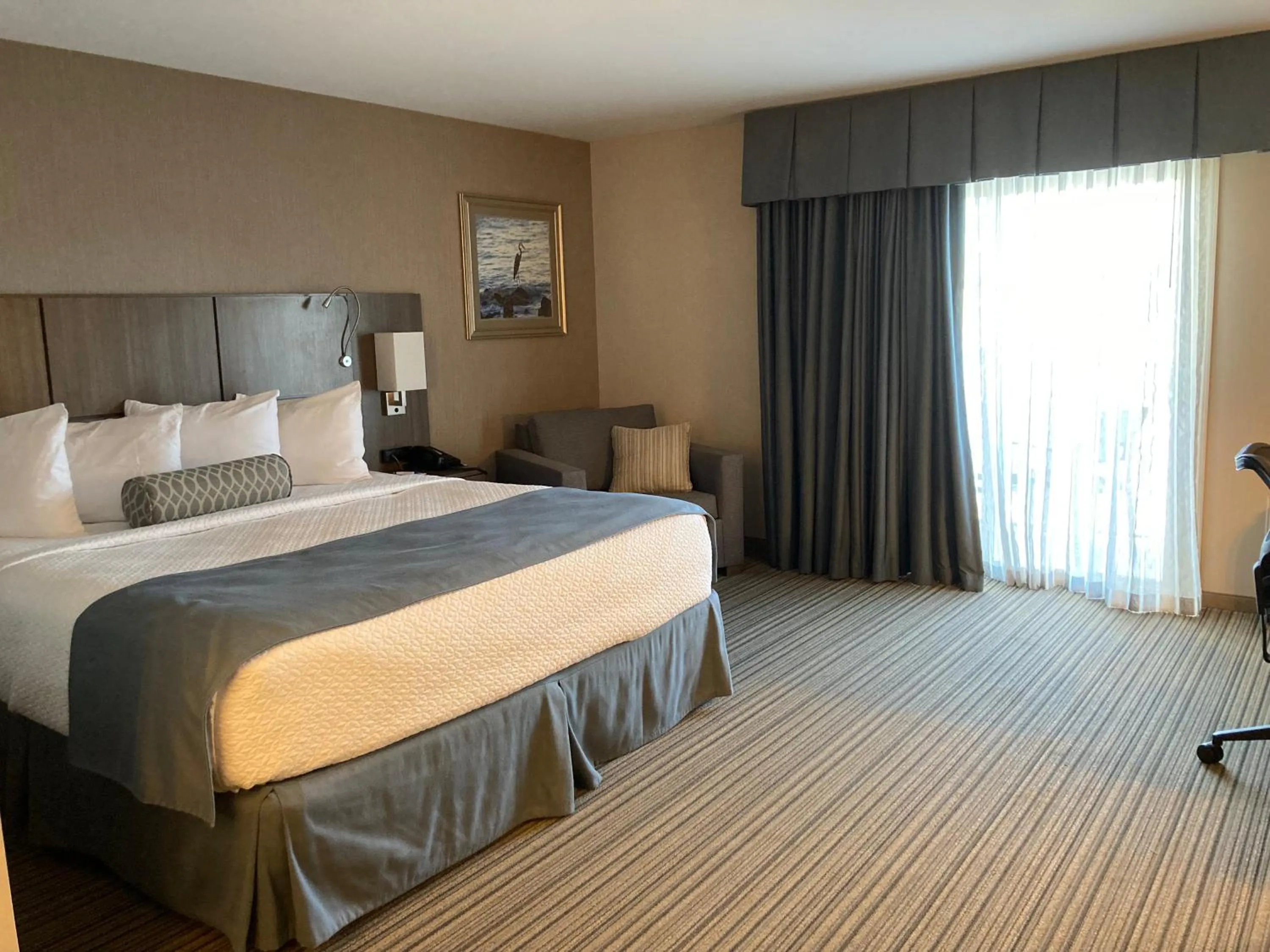 Bed in Anchored Inn at Hidden Harbor