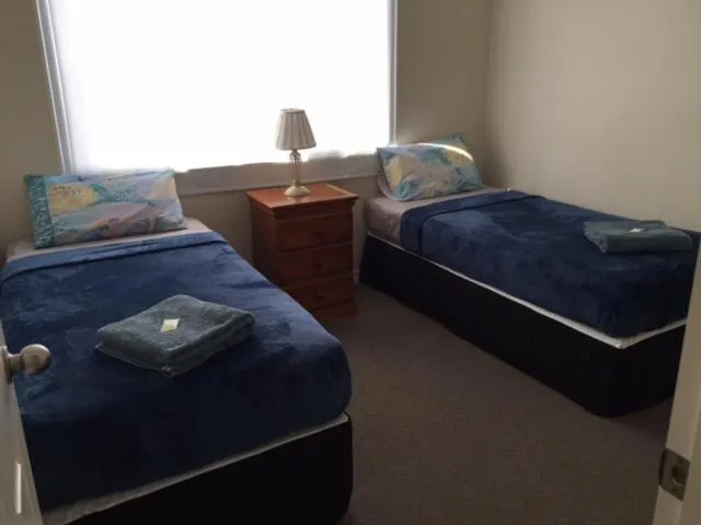 Bedroom in Holland Park Motel