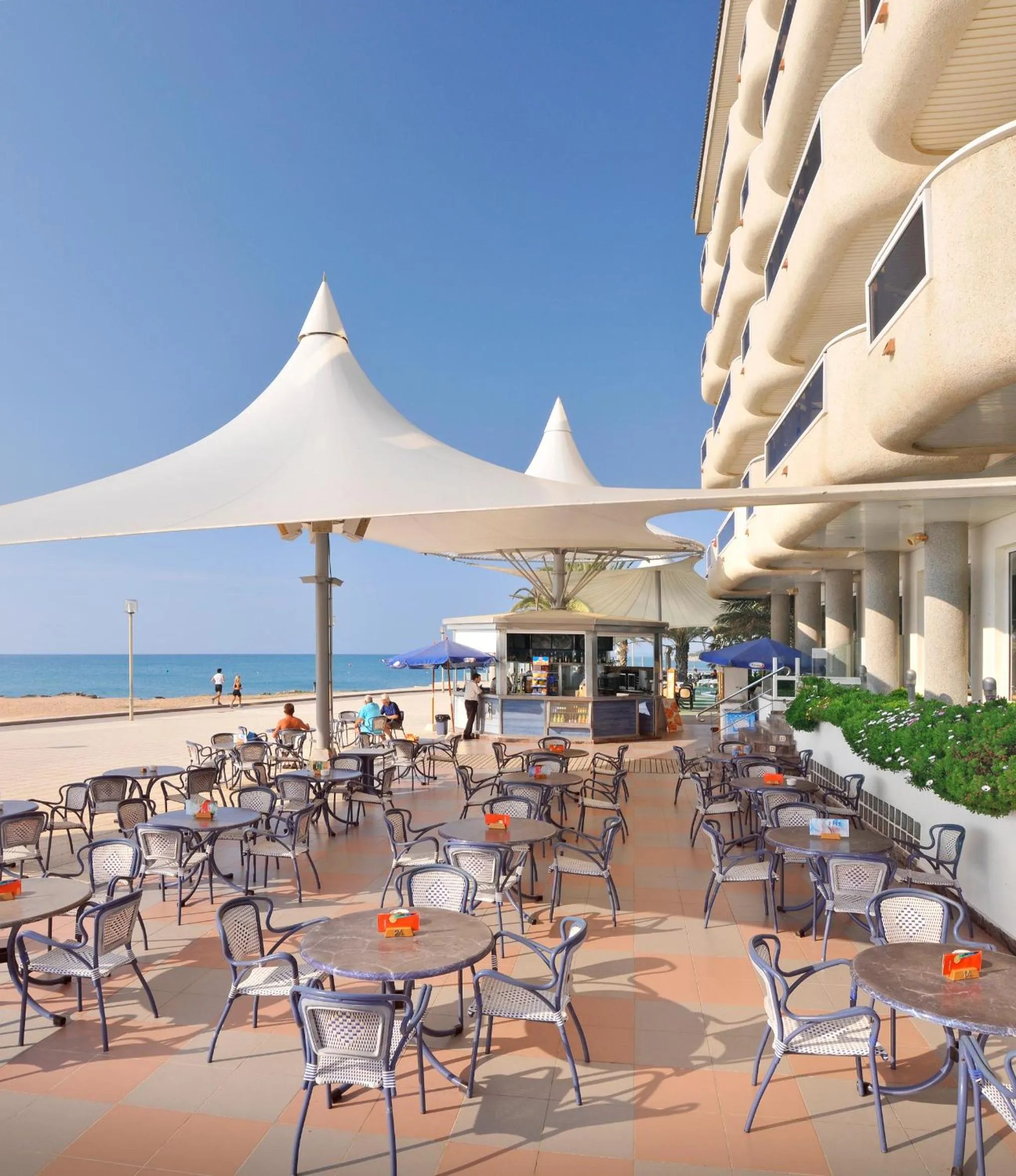 Patio in Caprici Beach Hotel & Spa