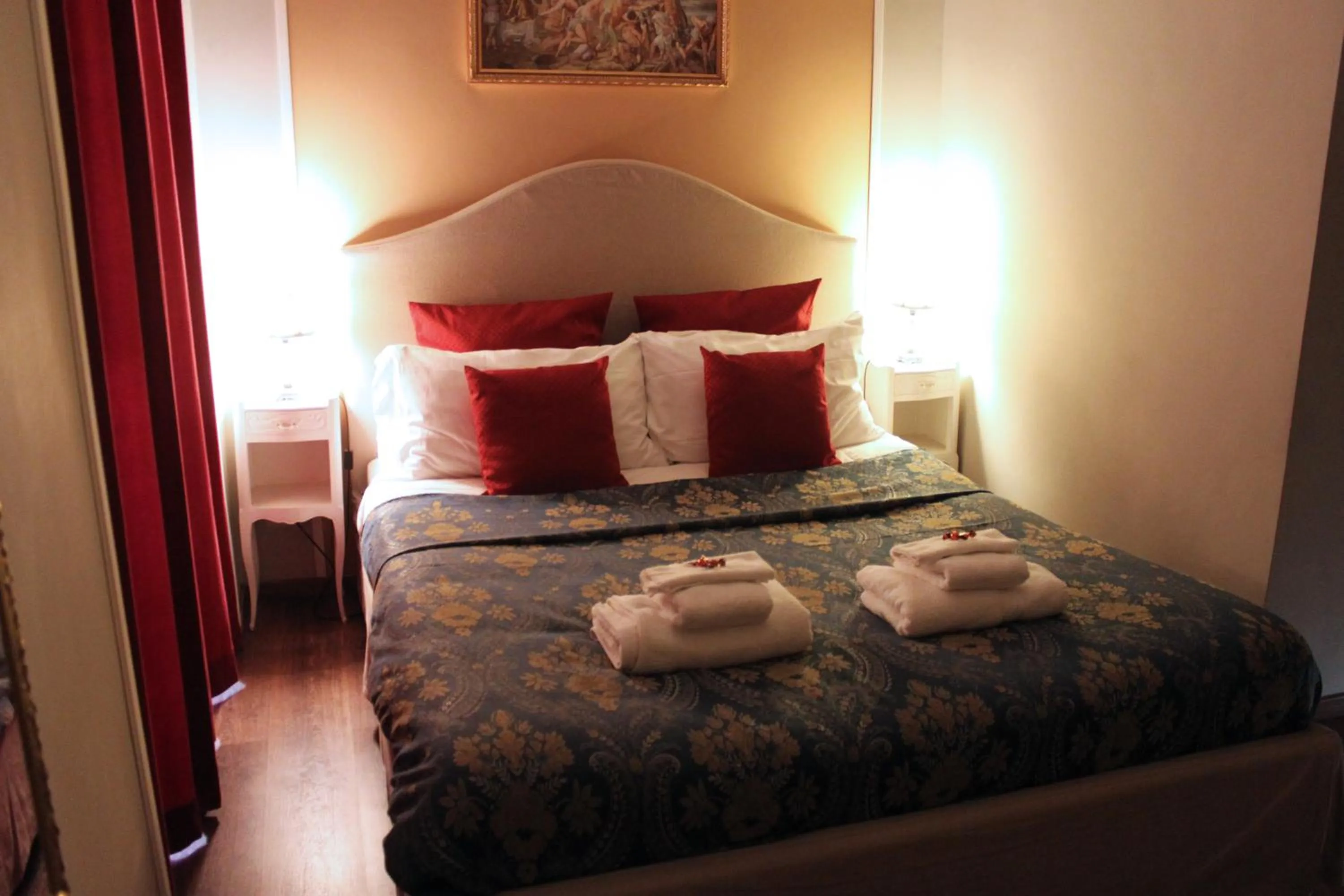 Bed in Raphael Rooms