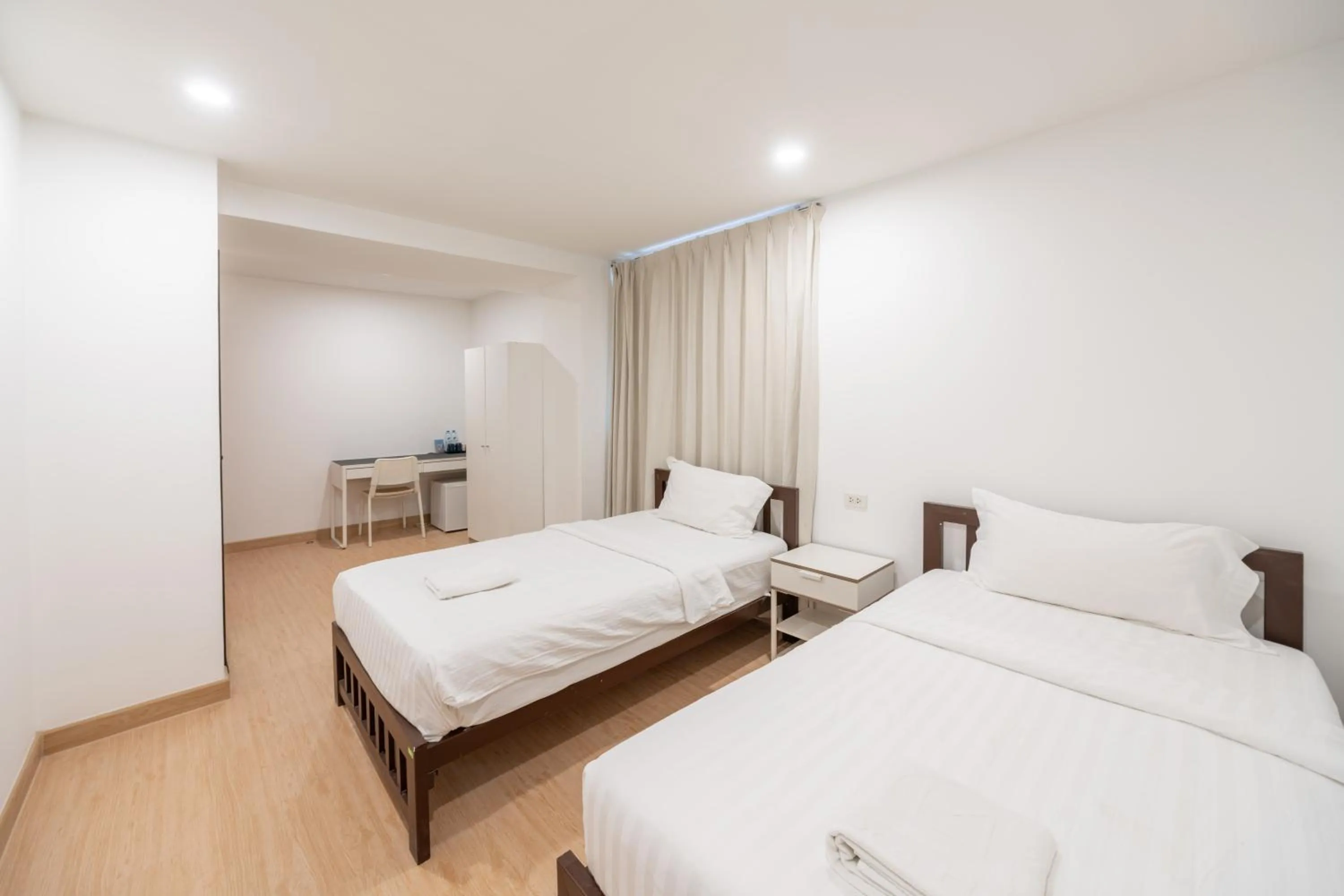 Photo of the whole room, Bed in We Inn