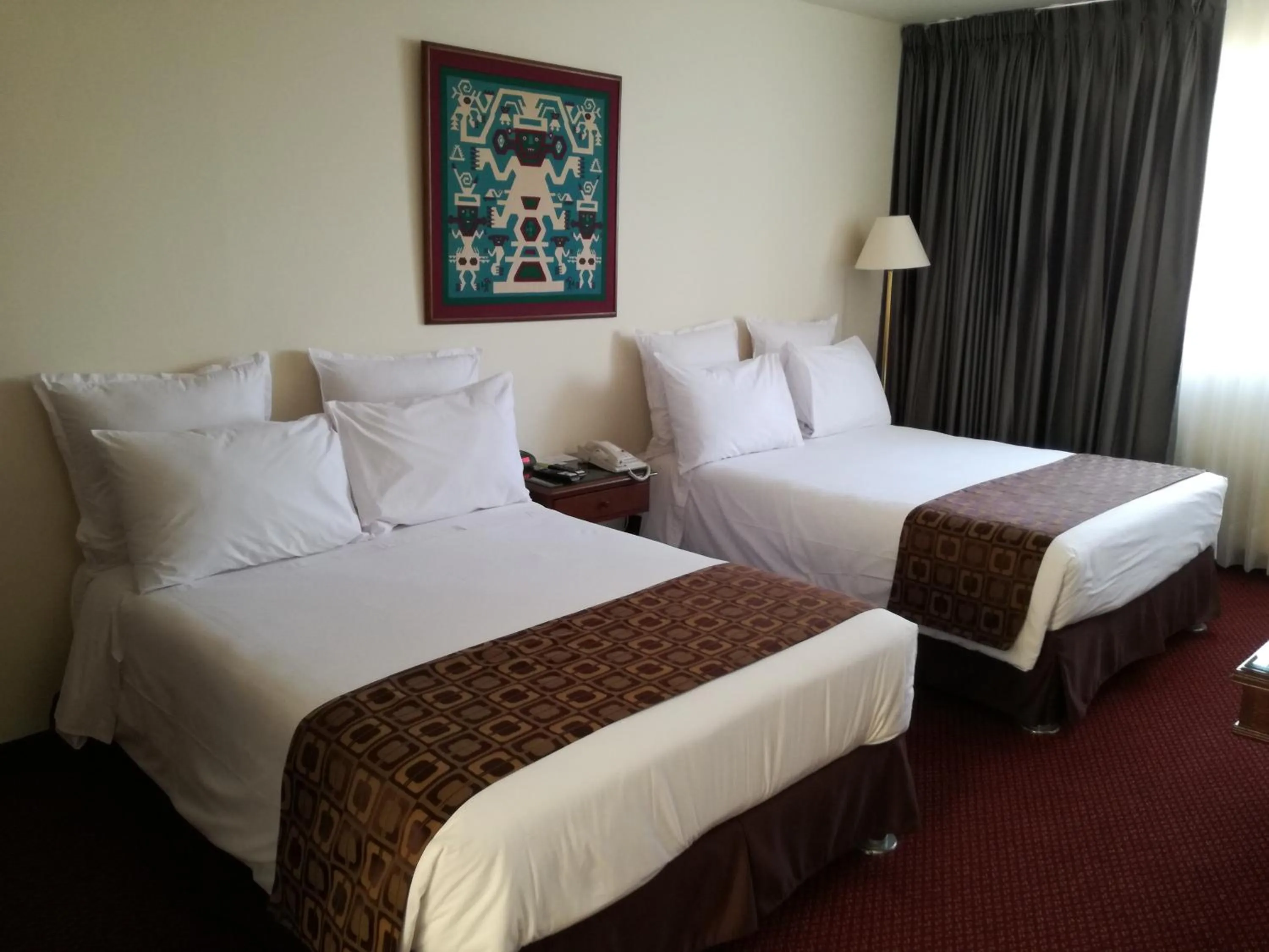 Bed in Hotel Carrera