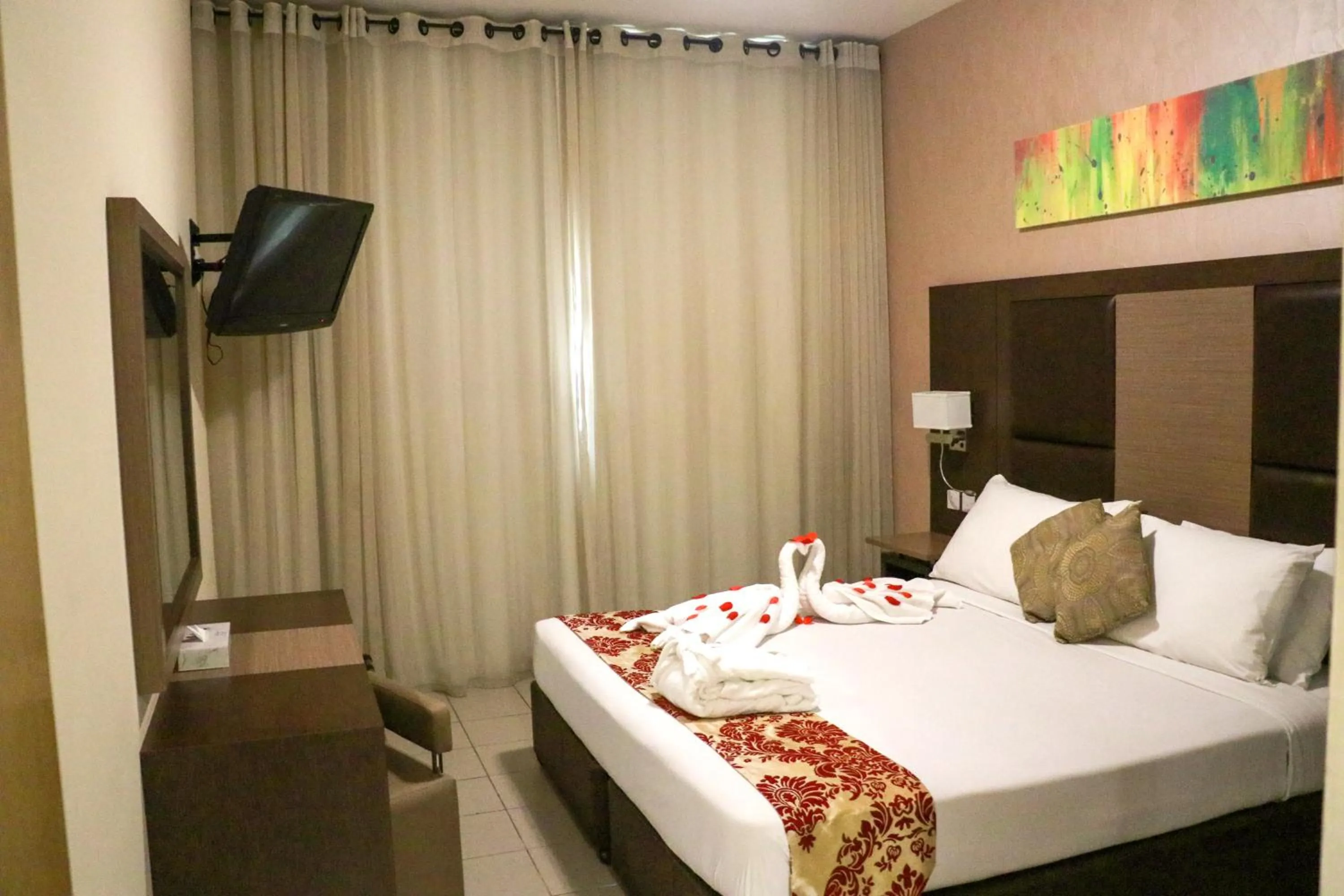 Bed in Spark Residence Hotel