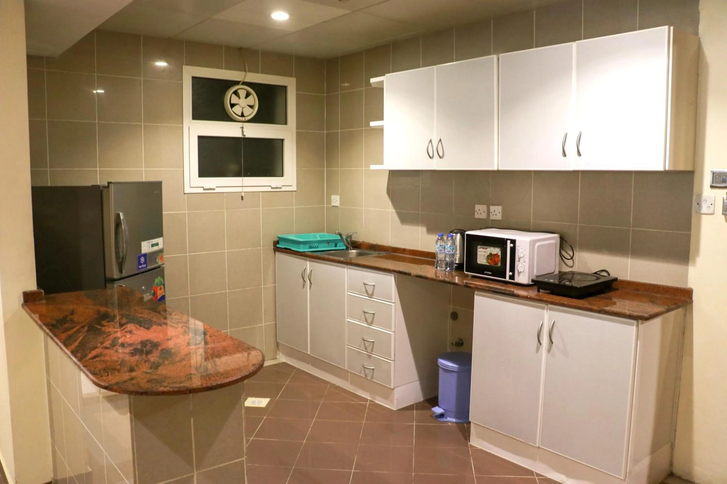 Kitchen or kitchenette in Spark Residence Hotel