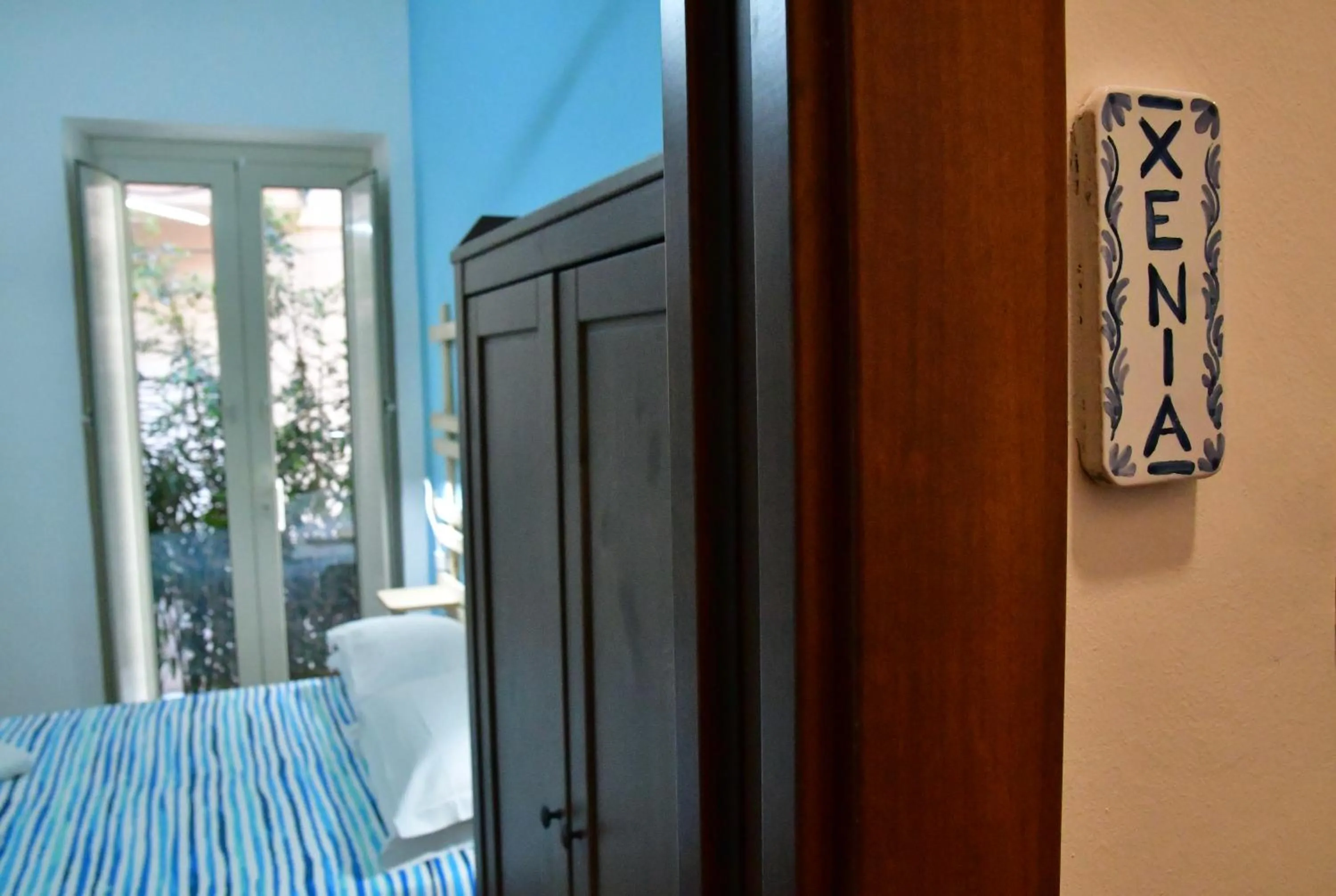 Property logo or sign, Bed in Casa Cifali