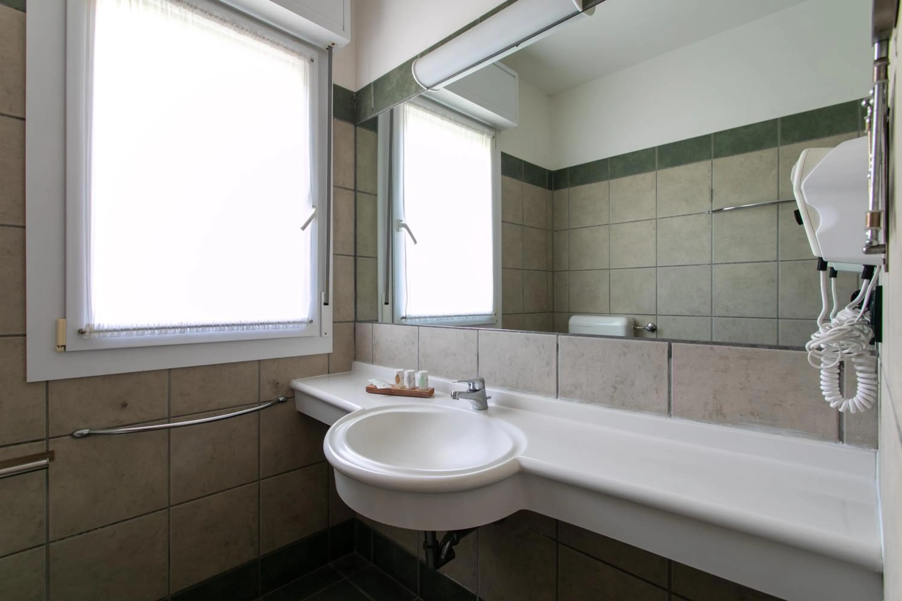 Bathroom in Harvey Suites Hotel & Residence