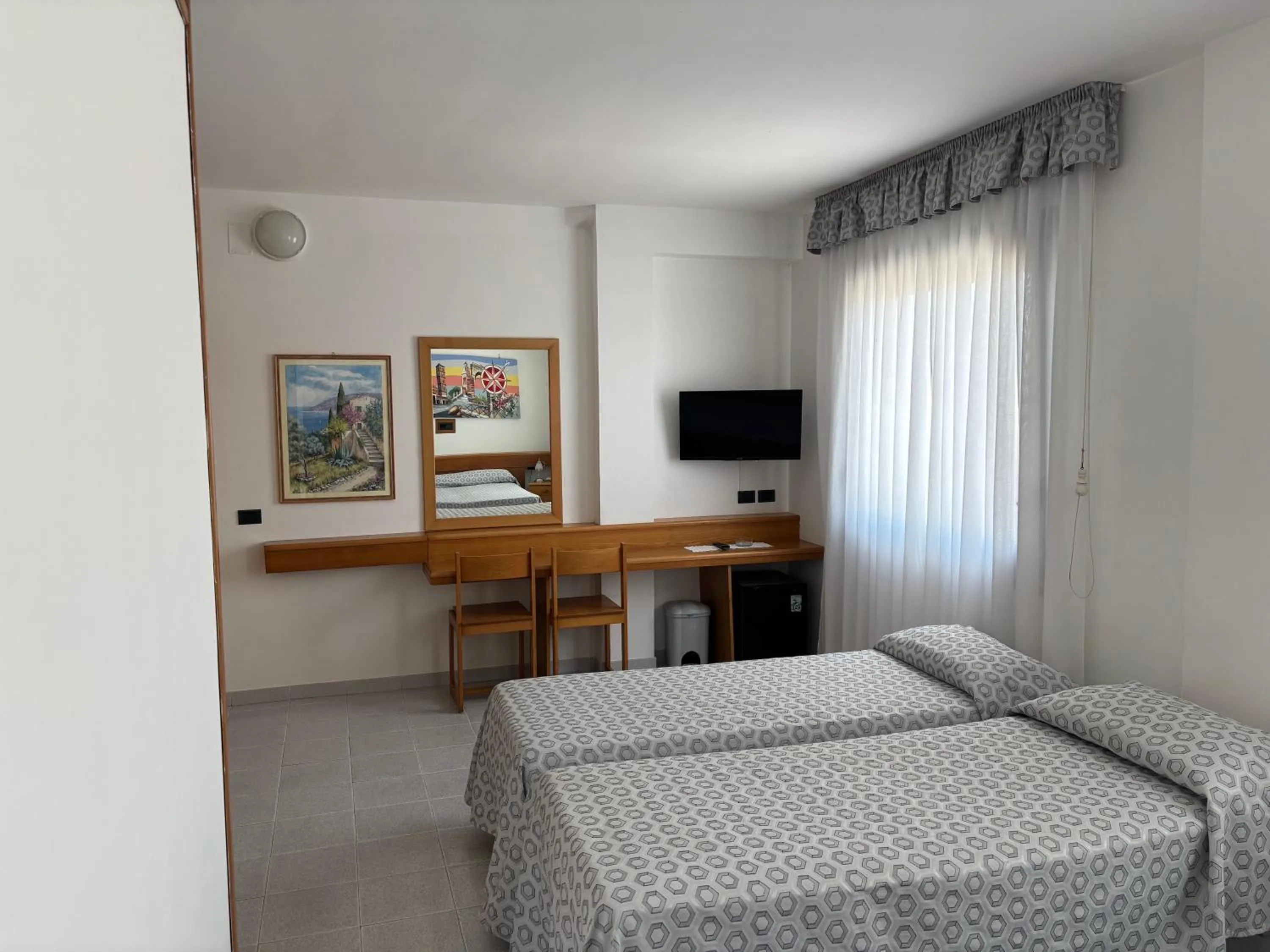 Bed in Hotel Le Palme