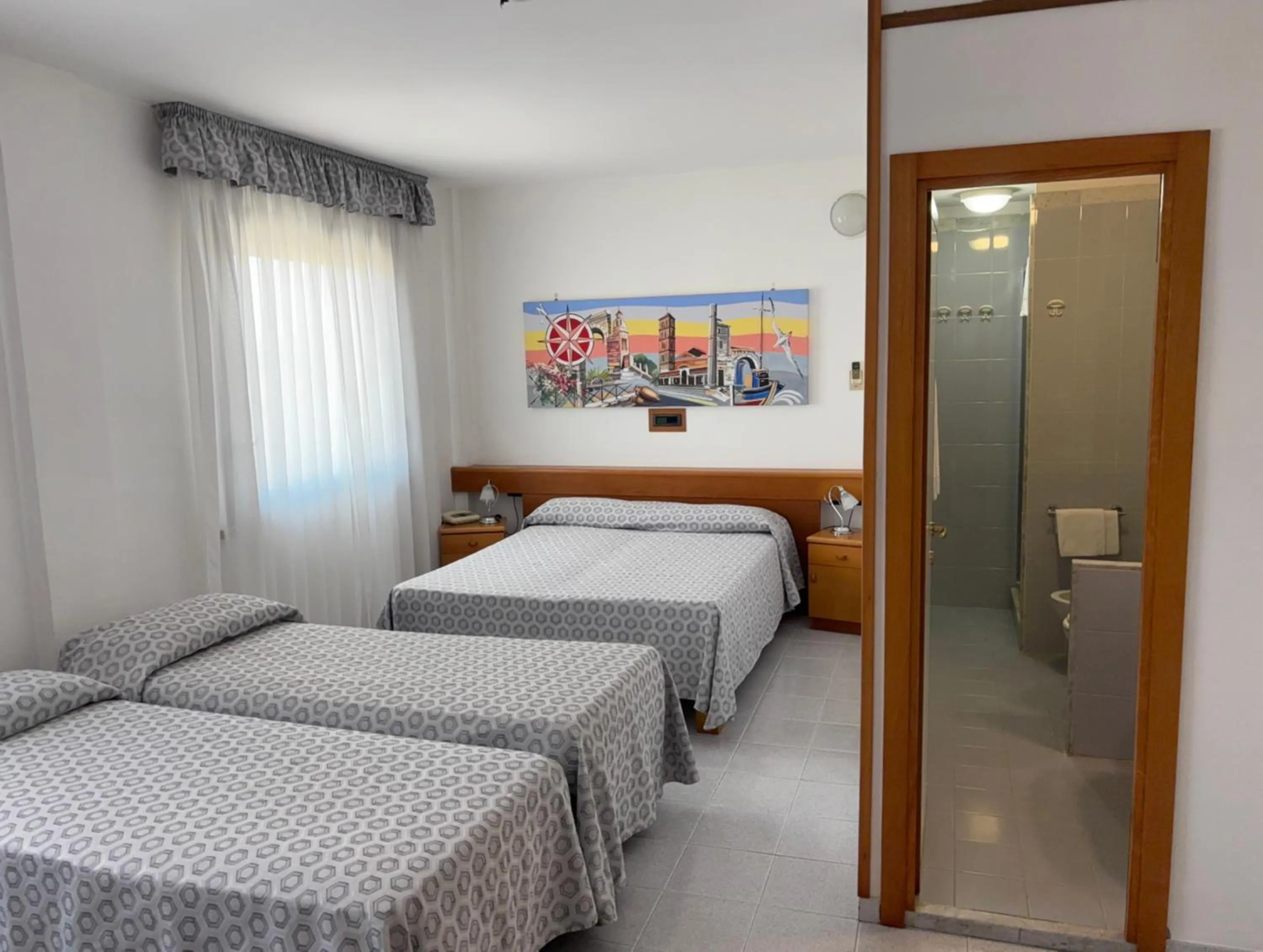 Bed in Hotel Le Palme