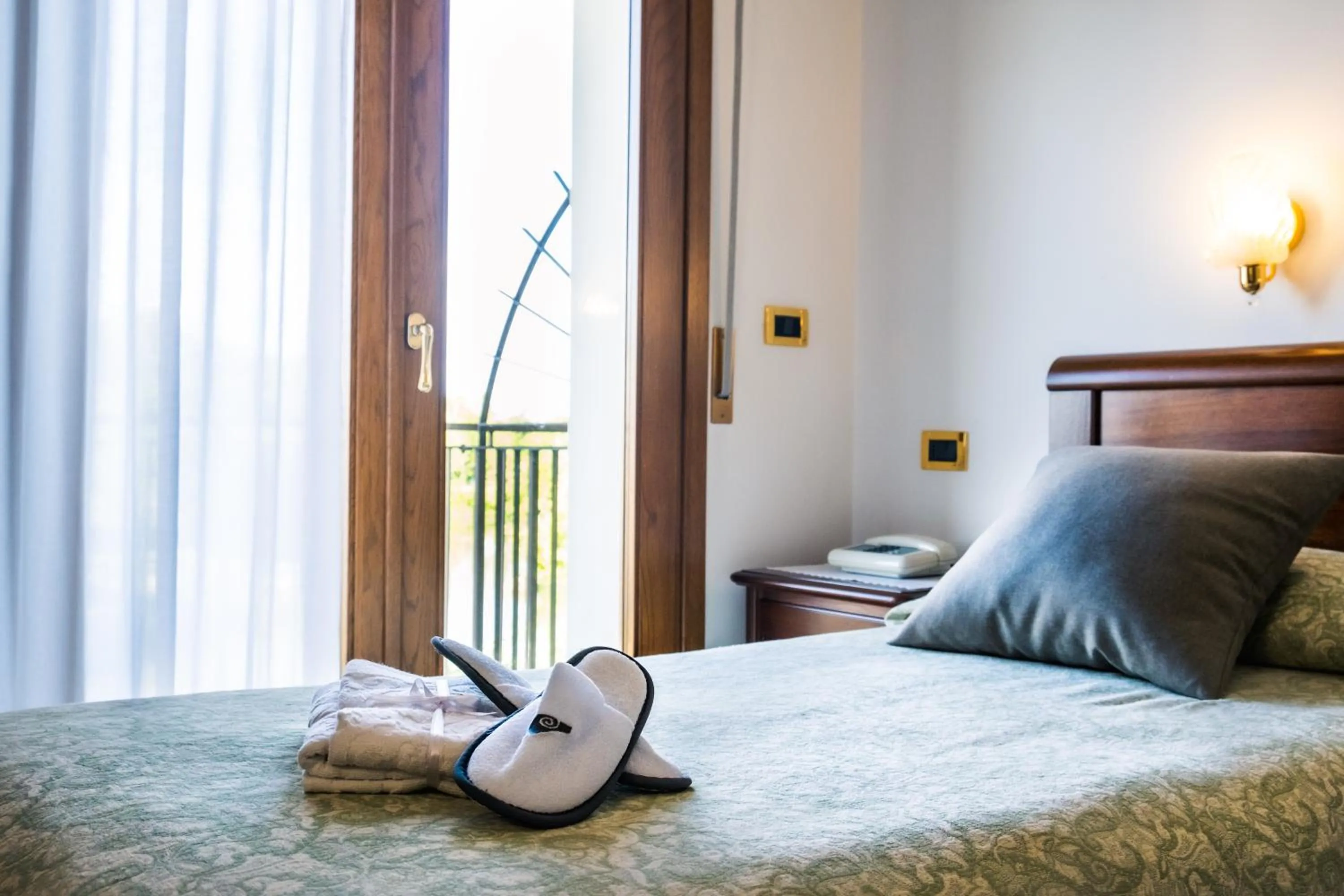 Bed in Hotel Da Gigi