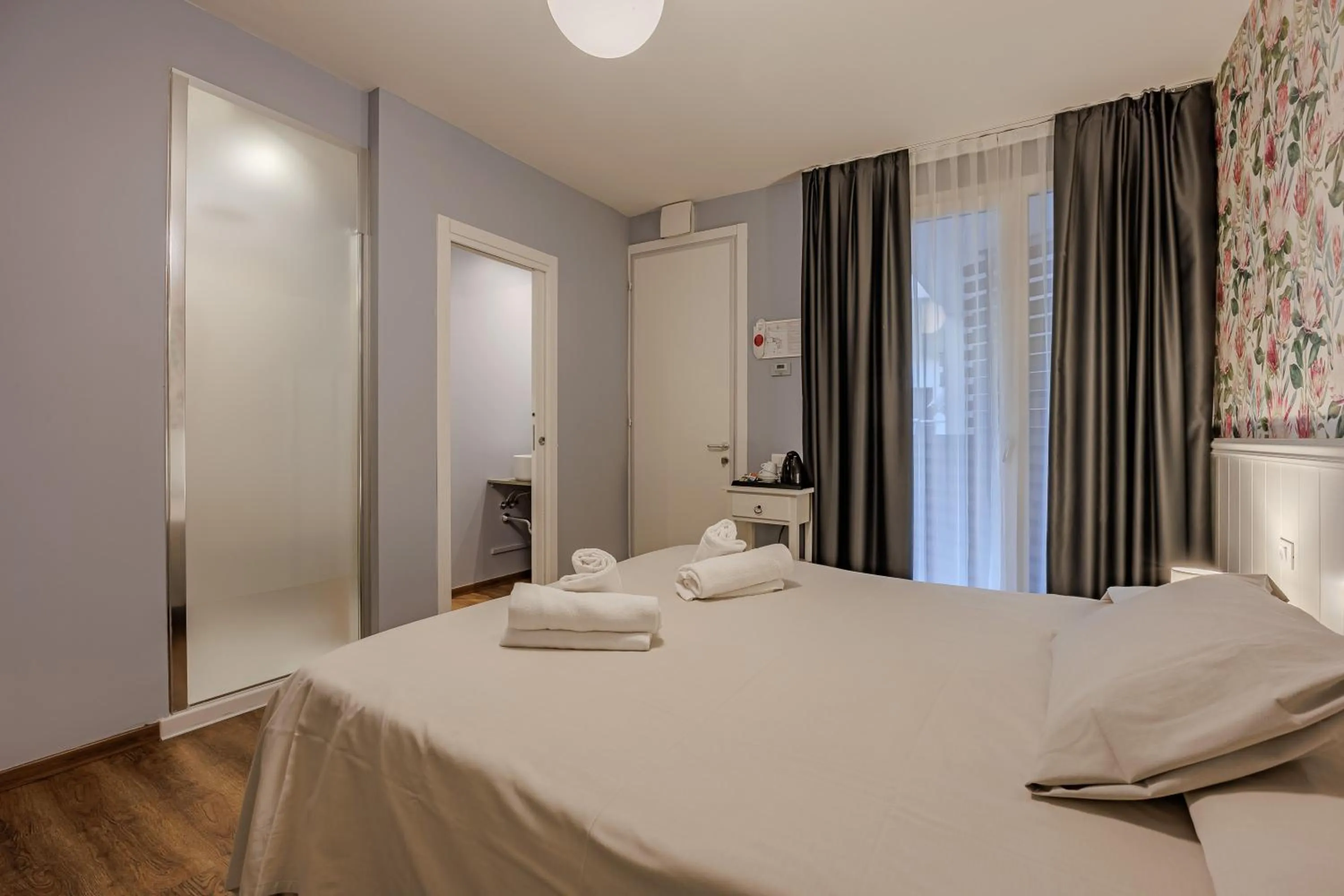 Bed in Hotel Maximilian