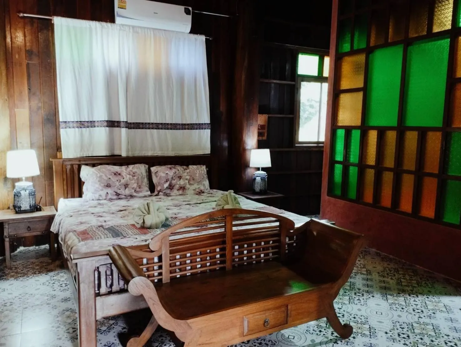 Bed in Nan De Panna Resort and Spa