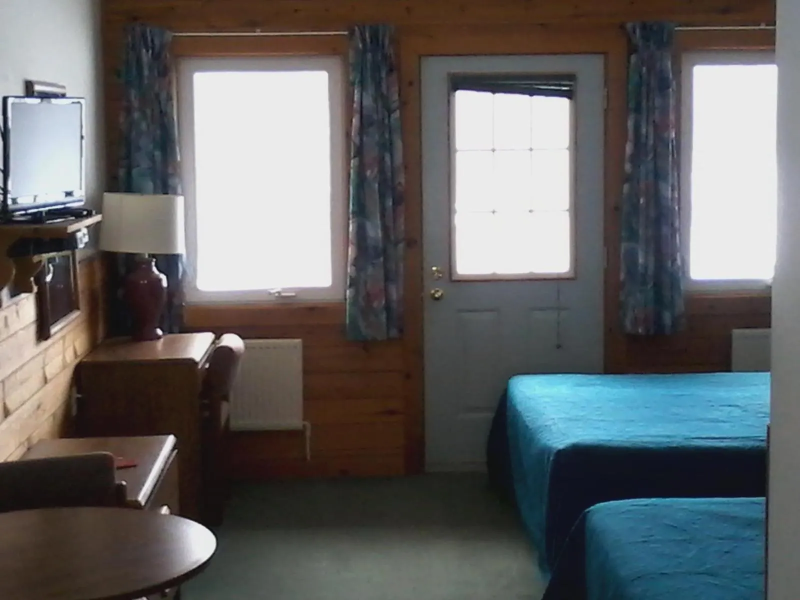 Bed in Quiet Bay Inn & Café